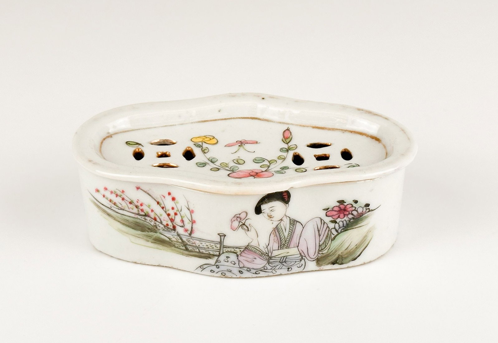 Antique Chinese Porcelain Rouge Box, Circa 1895: Box features pierced lid with hand painted motifs and gold accents. Circa 1895. Approximately 1.5 in H x 4.75 in W x 2.75 in D. Weighs approximately 1 lbs. LOCAL PICK UP INFORMATION: Wednesday, June 1