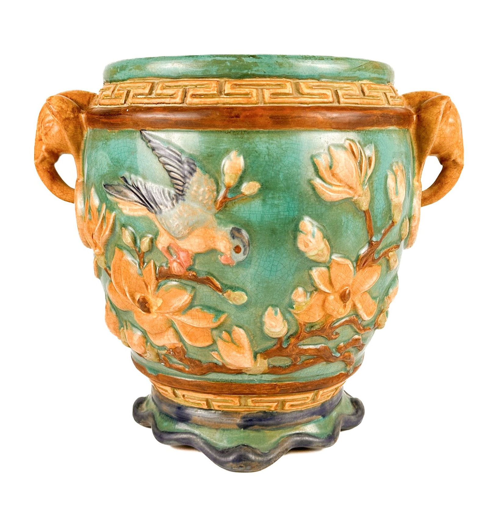 Chinese Sancai Glazed Ceramic Vase with Elephant Handles: Ceramic vessel is painted with various glazes in shades of green, blue, brown, and white. Depicts a bird in a magnolia tree with traditional motifs framing the work, and elephant head handles. No mark