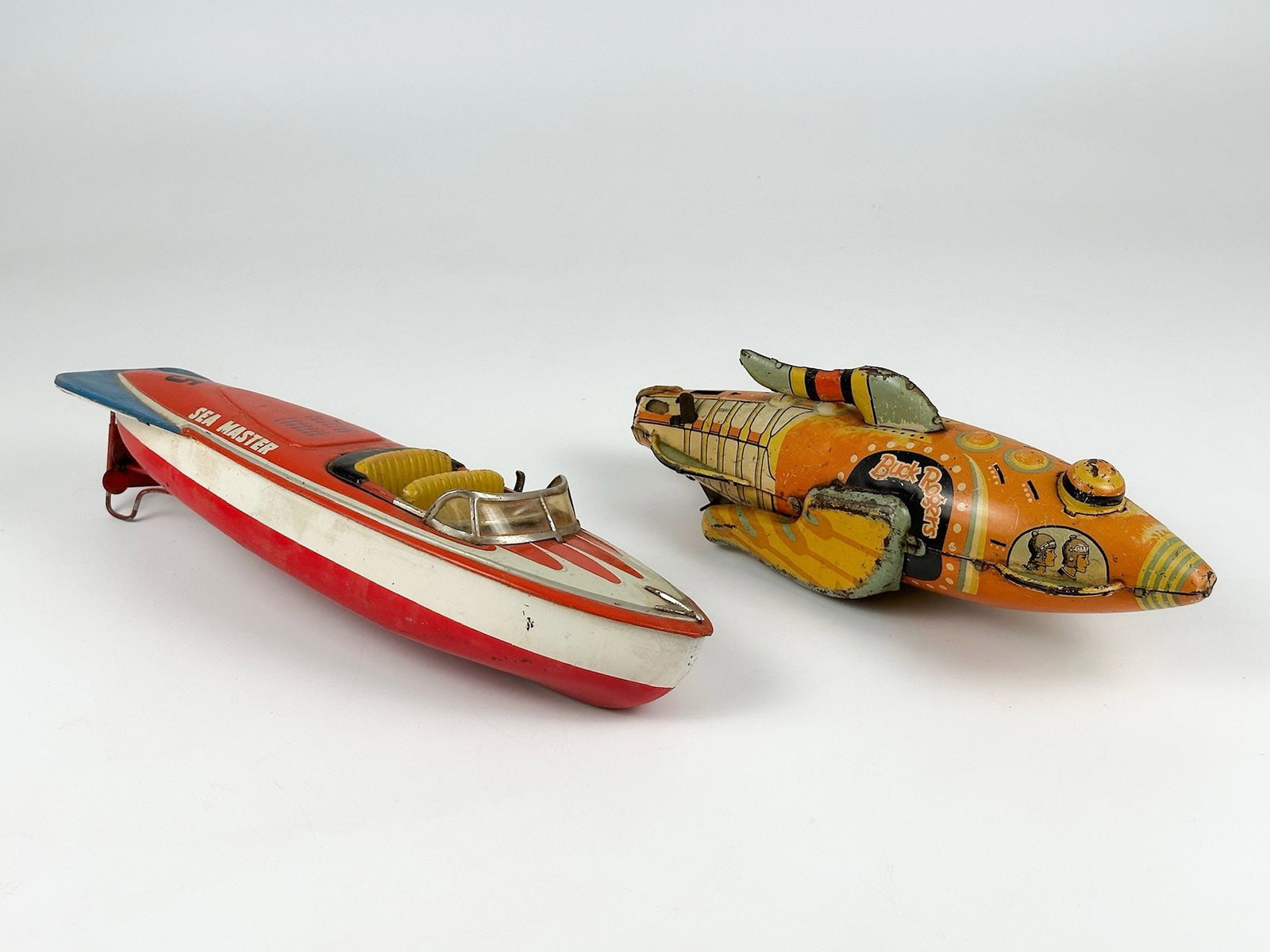 Vintage Tin Toys: Buck Rogers Spaceship and Speed Boat (1 of 2)