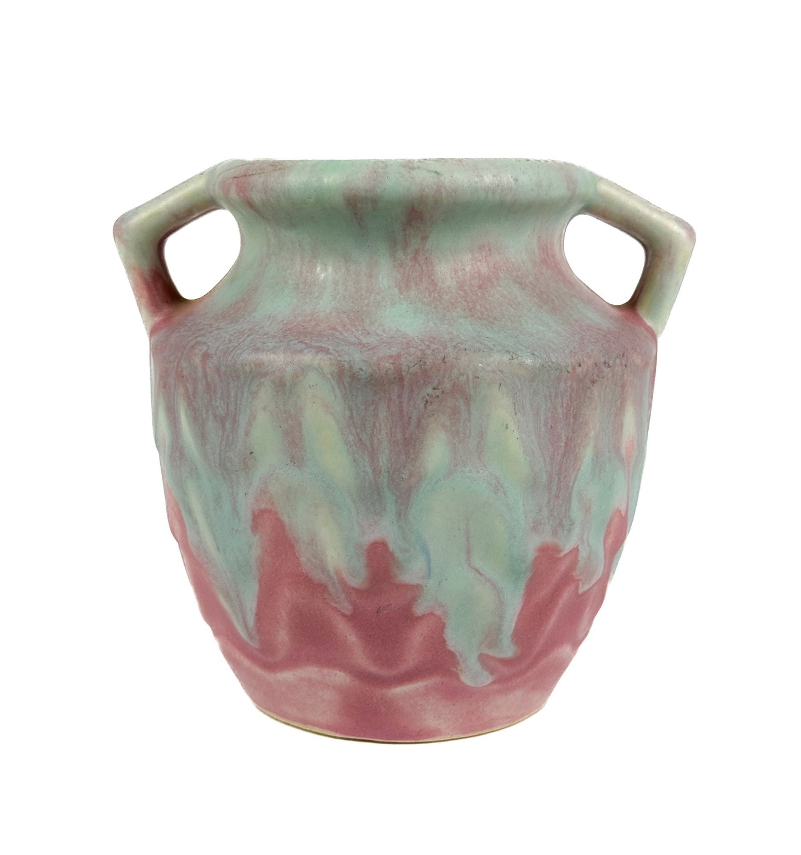 Muncie Style Pottery Vase with Handles: Ceramic vase has small handles with a light blue glaze over a rose toned base. Approximately 4.75 in H x 5.25 in W x 4.5 in D. Weighs approximately 1 lbs. LOCAL PICK UP INFORMATION: Wednesday, July 8,