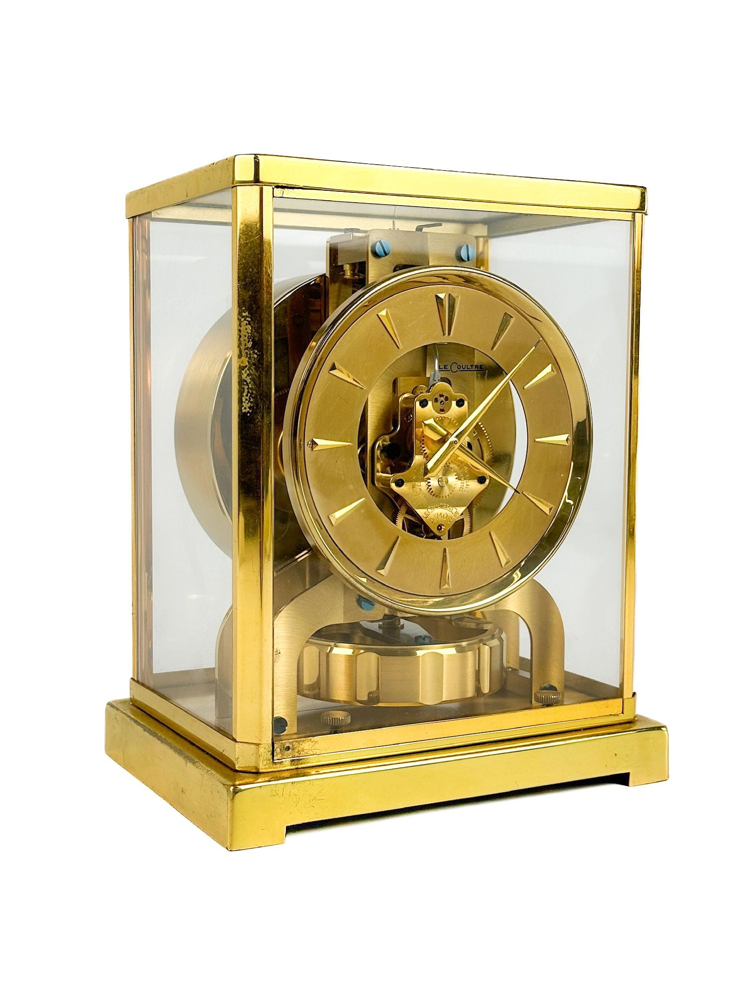 Jaeger-LeCoultre Atmos Clock, Brass and Glass, Mid 20th Century: Jaeger-LeCoultre "Atmos" perpetual-motion mantel clock, Switzerland, mid-20th century. Serial number "81552" on top, Dimensions: Clock is approx. 8.75 in H x 6.5 in W x 5.5 in D. Weighs 7 lbs 8 oz. LO
