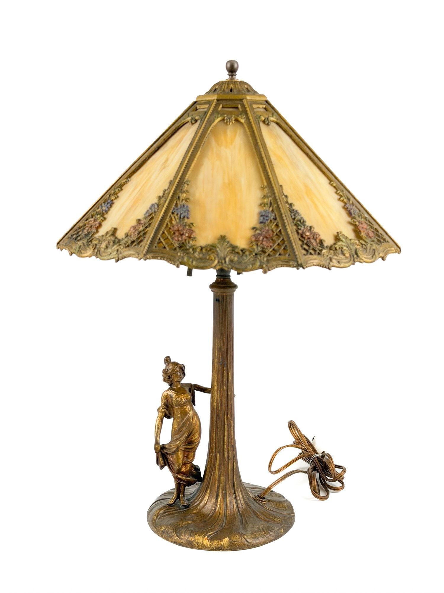 Antique Slag Glass Panel Table Lamp, Figural Tree-Trunk Base with Maiden: Lamp features ornate lampshade with pierced metal filigree and flowers. Base features a cast woman in a dress. Glass panels are marbleized tan. Approximately 19 in H x 14.5 in W x 14.5 in D. Weighs ap