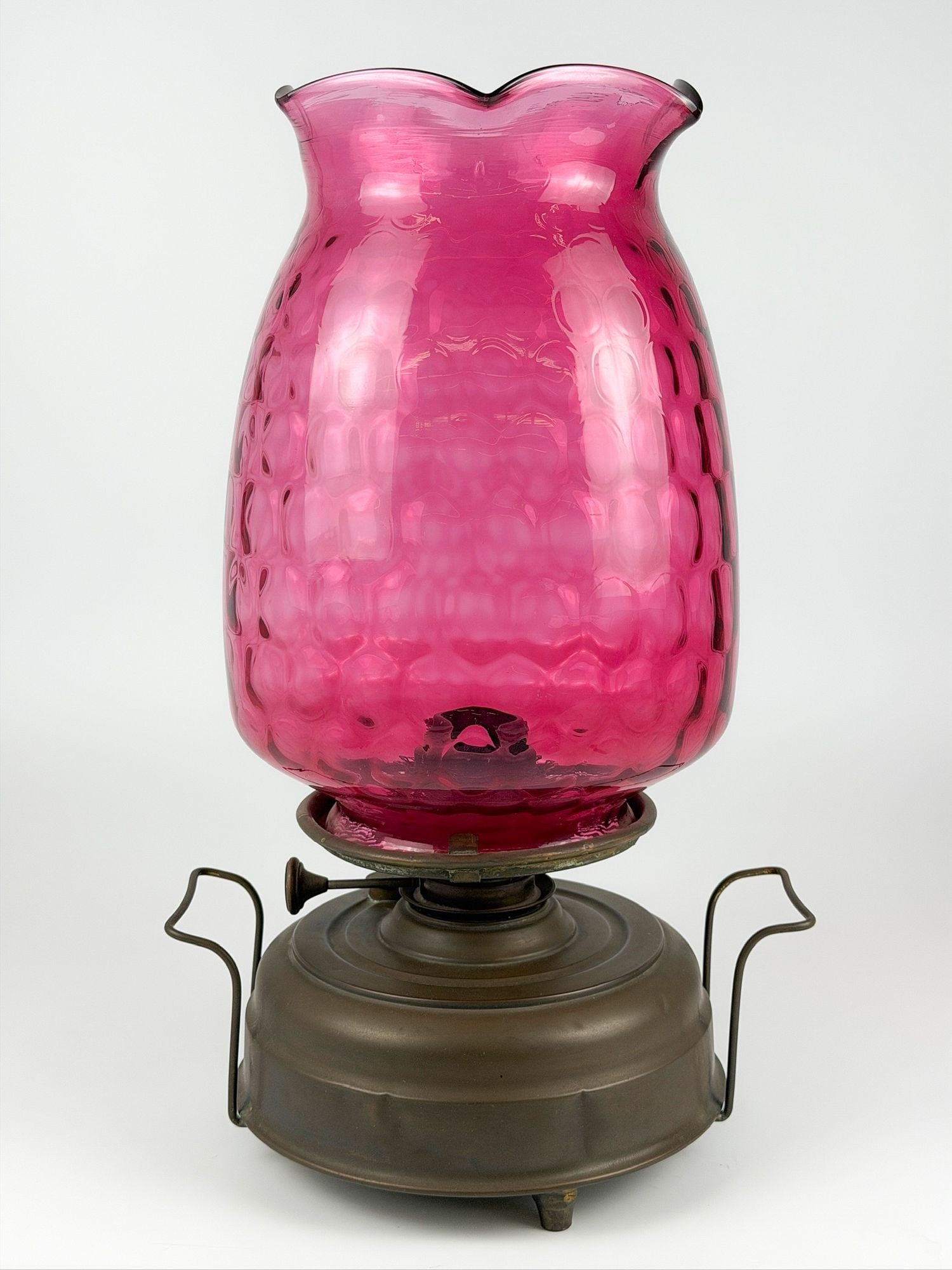 Victorian Cranberry Glass Hurricane Oil Juno Safety Lamp: Juno Safety Lamp. Pink tulip glass with brass base with handles. Made in Germany. Approximately 19.25 in H x 11.75 in W x 9 in D. Approximately 7 lbs 5 oz. LOCAL PICK UP INFORMATION: Wednesday, July 8