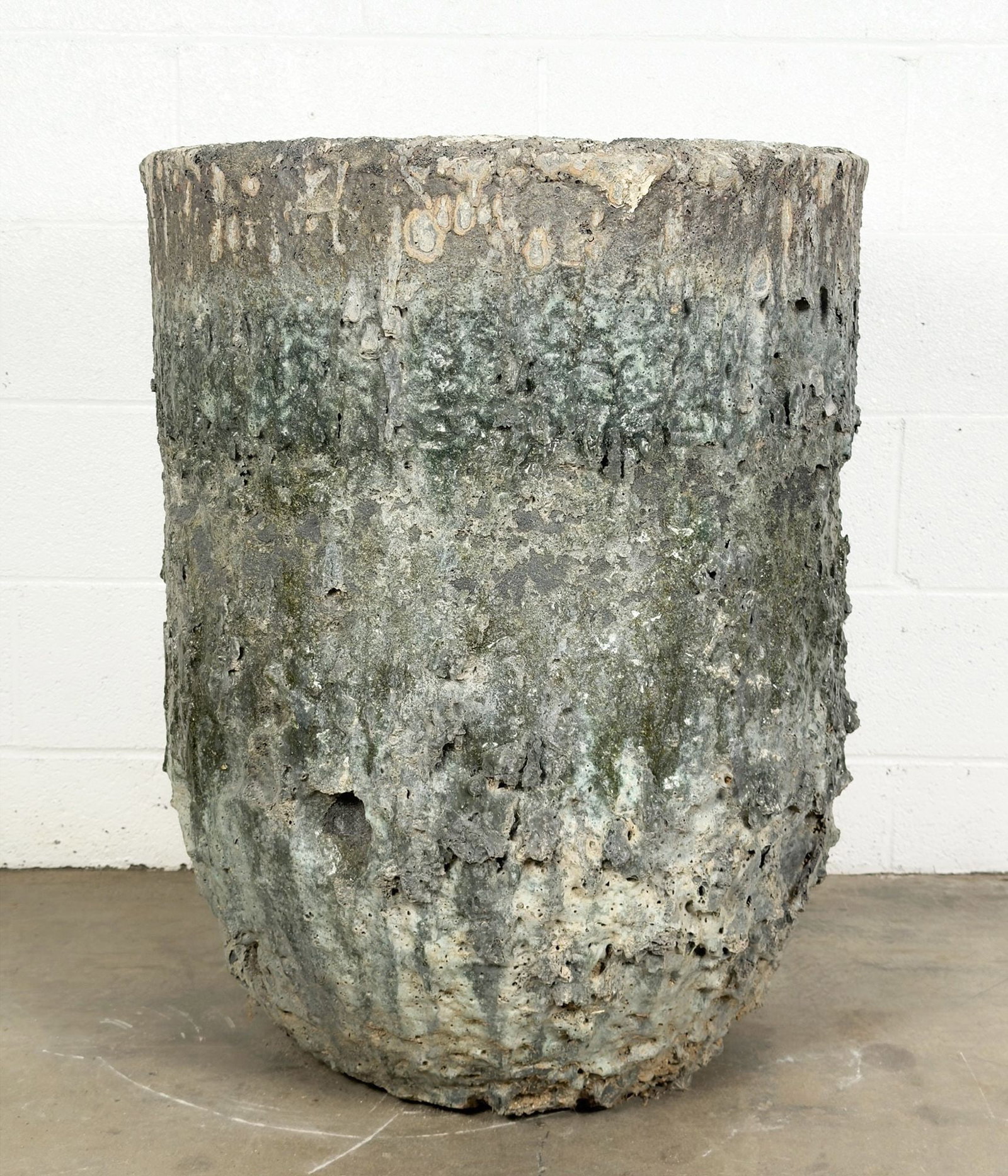 Antique Foundry Crucible Planter, 32 Inches Tall: Used as a crucible, turned into a plantar. Two-inch hole in the base for water drainage. Textures and colors from years of foundry use. Approximately 32 in H x 24.5 in W x 24.5 in D. LOCAL PICK UP INF