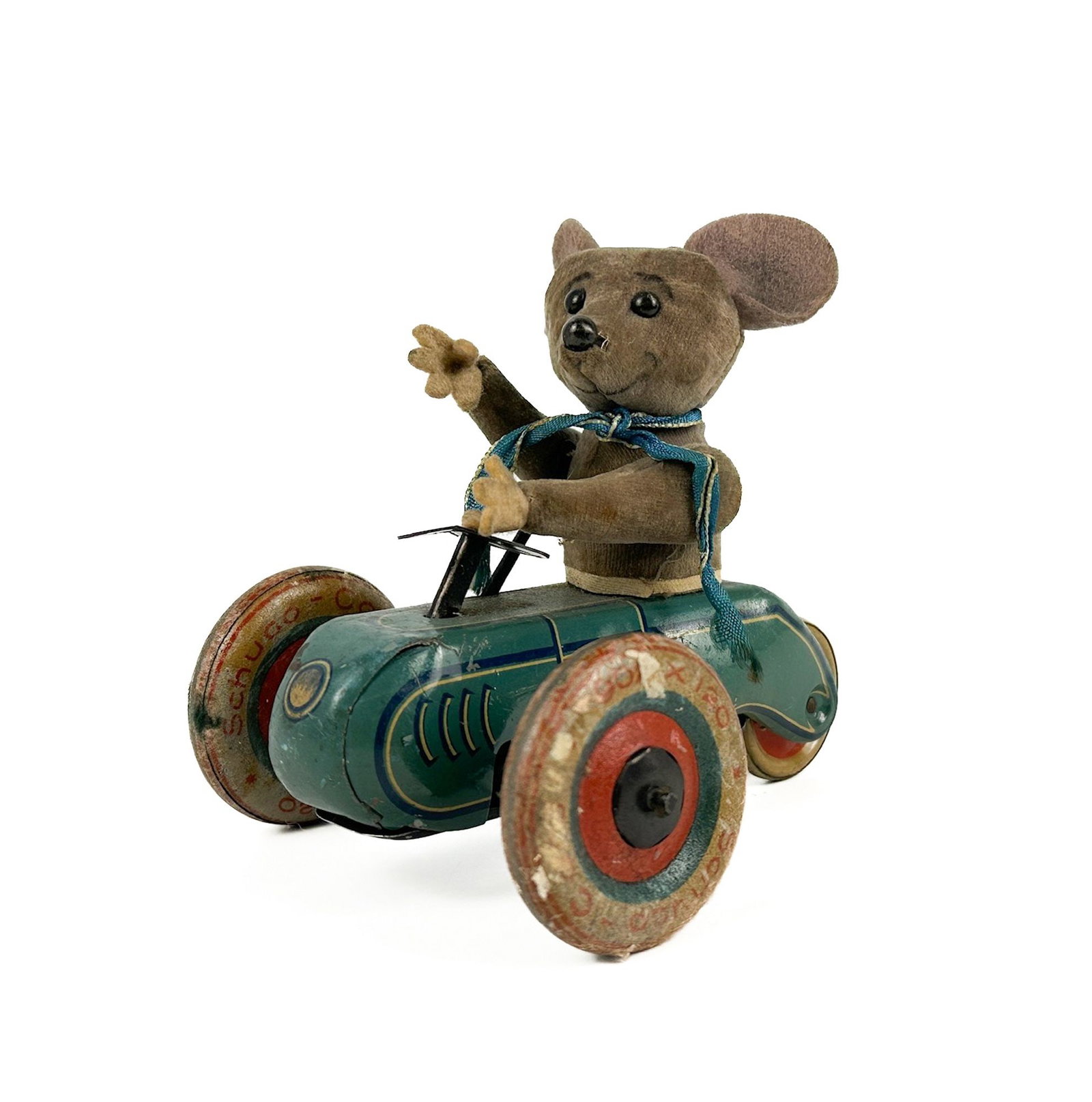 Schuco 853 Mouse Tricycle Scooter Windup Toy Car: Made in Germany. Trademark painted on door. Schuco marking on tires. Arm goes up and down as wheels roll. Dimensions: Toy is approx. 4.5 in H x 5 in D x 4 in W. Weighs 1 lb. LOCAL PICK UP INFORMATION: