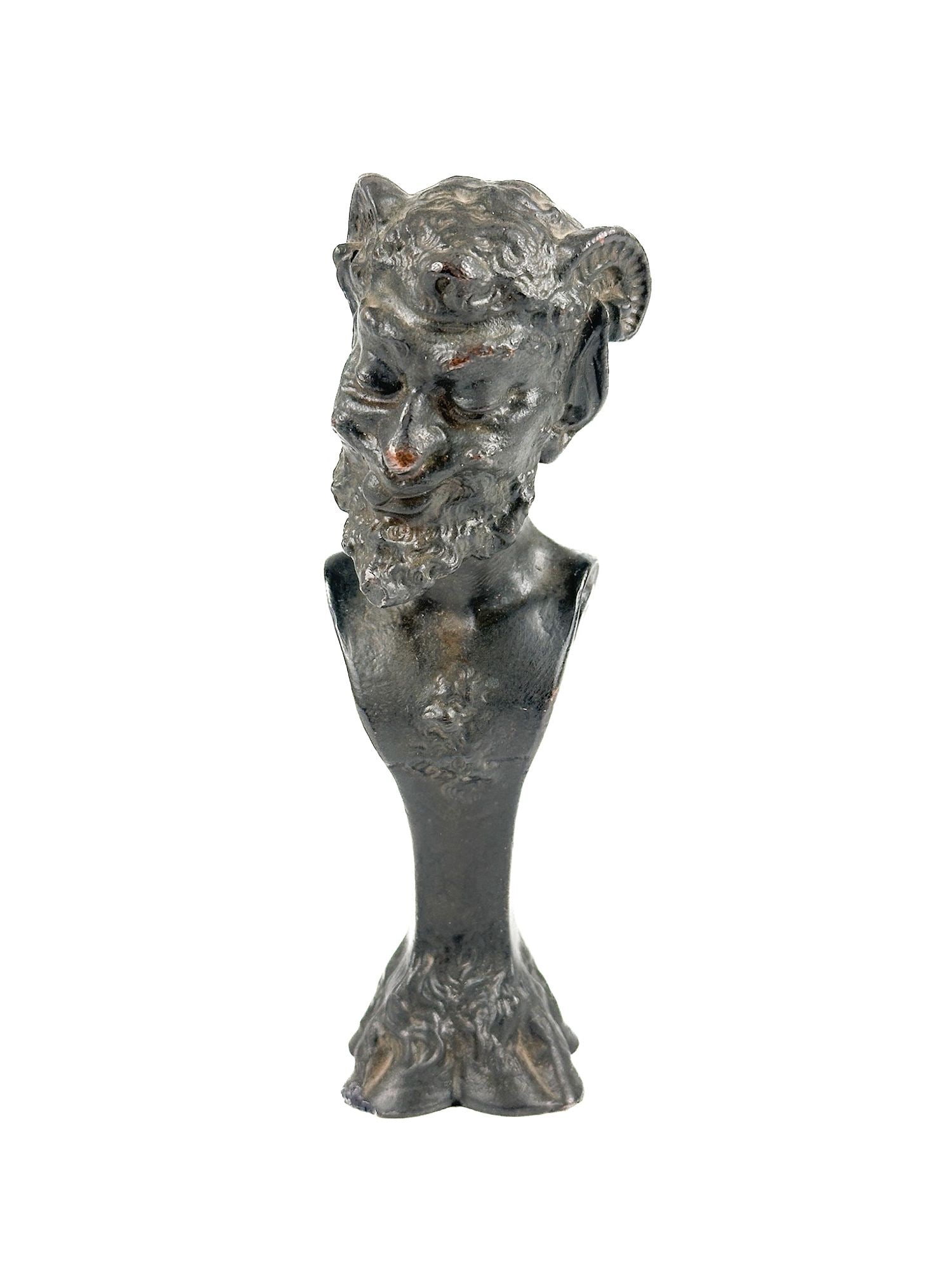 Attributed To Alexandre Caron, Satyr Bronze Bust: Miniature bust is made of bronze. Depicts a bust of a smiling satyr with curled hair and beard details as well as horns and hoofed details on the base. Approximately 4.75 in H x 1.25 in W x 1.75 in D.