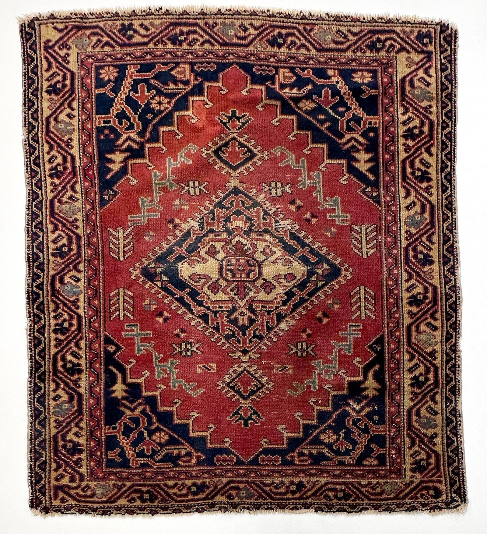Antique Hamadan Persian Rug: Vintage Persian rug with blue, beige and red tones. Geometric pattern. Hand knotted. Dimensions: Rug is approx. 45.5 in W x 40 in W. Weighs 4 lbs 6 oz. LOCAL PICK UP INFORMATION: Wednesday, July 8, 10