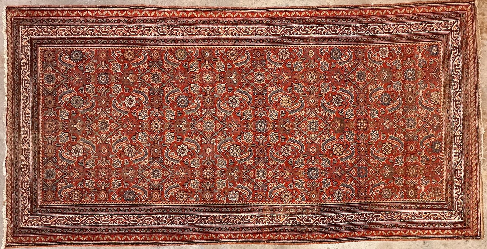 Antique Persian Heriz Hand-Knotted Wool Rug, 9'10" x 4'10": Hand-knotted Persian Heriz antique rug, Red, green and blue. Warm earth tones. Dimensions: Rug is approx. 118 in L x 58.5 in W. Weighs 24 lbs. LOCAL PICK UP INFORMATION: Wednesday, July 8, 10:00 AM - 