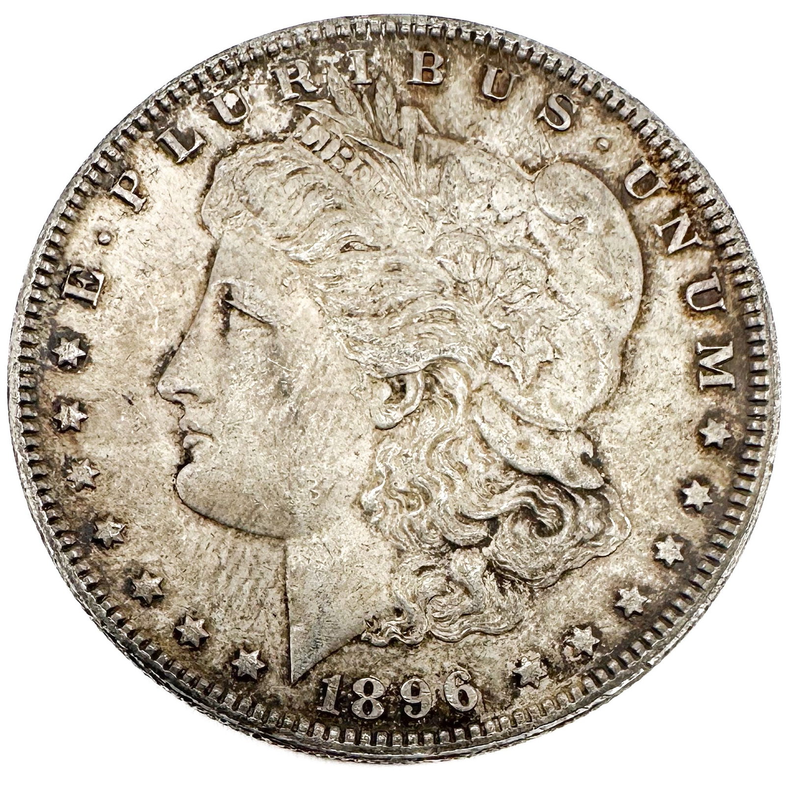 1896 Morgan Dollar: One 1896 Morgan silver dollar. Circulated common-date example of Morgan's Liberty-head-and-eagle design in 90% silver. Shipping & Handling. All lots won by the same bidder are combined 