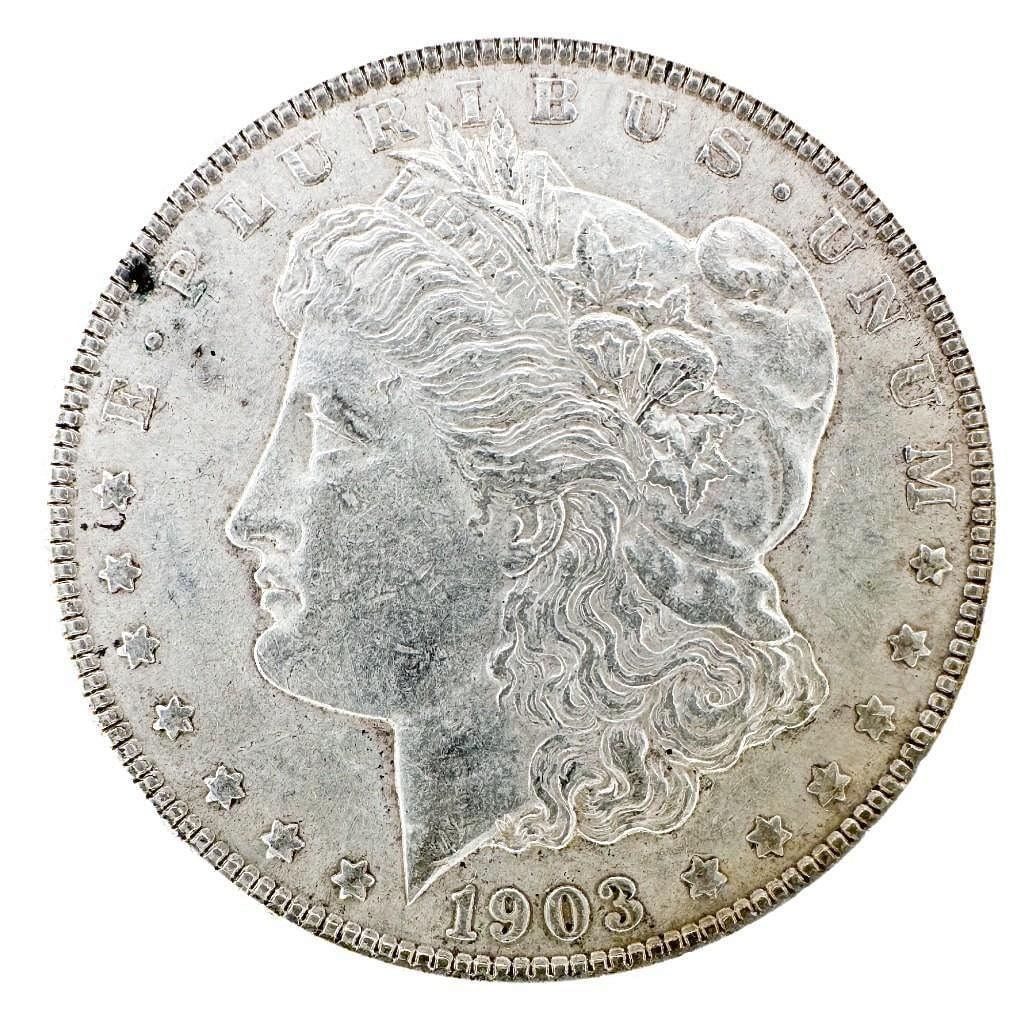1903 Morgan Silver Dollar: A 1903 Morgan dollar from the Philadelphia Mint. A slightly better Philadelphia issue. Shipping & Handling. All lots won by the same bidder are combined into one shipment via USPS Priority Mail (track