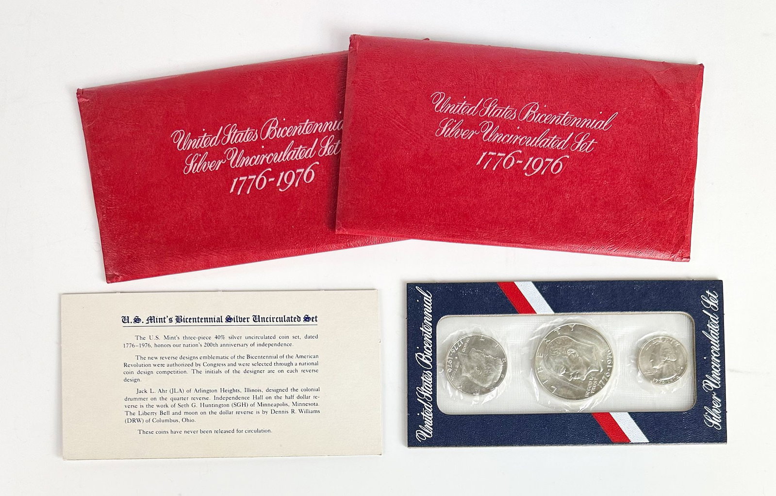 Lot of 2 1976 Bicentennial Uncirculated Silver Sets (40% Silver): Two 1976 three-coin Bicentennial uncirculated sets. Each set holds the Bicentennial quarter, half and dollar. Shipping & Handling. All lots won by the same bidder are combined into one shipment via US