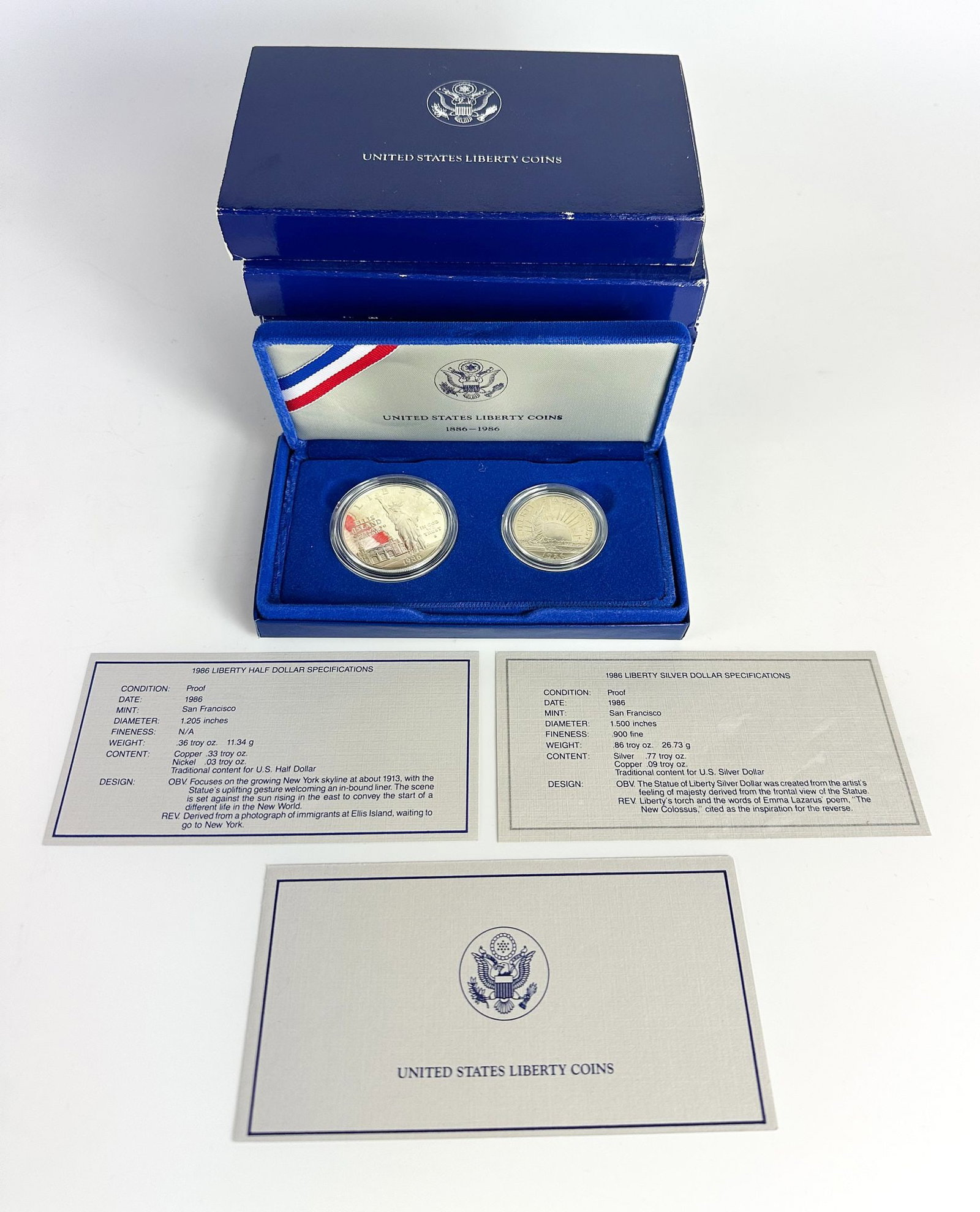 Lot of 5 1986 Statue of Liberty Dollar & Half Dollar Proof Sets: Five 1986 Statue of Liberty two-coin proof sets. Issued for the Statue of Liberty centennial. Shipping & Handling. All lots won by the same bidder are combined into one shipment via USPS Priority Mail