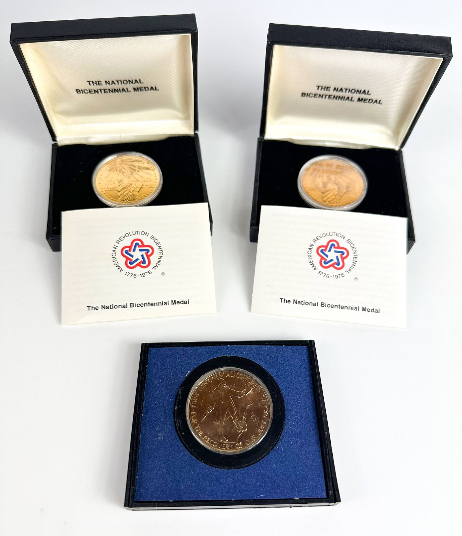 Lot of 3 1776-1976 American Revolution Bicentennial Medals: Three National Bicentennial medals commemorating the American Revolution, two boxed and one cased. Issued for the 1976 U.S. Bicentennial. Shipping & Handling. All lots won by the same bidder are combi