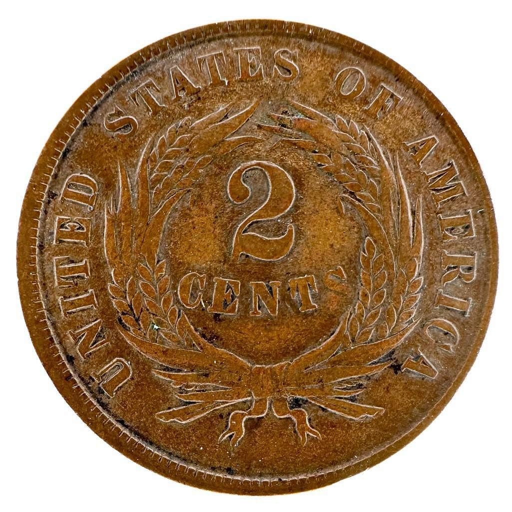 1864 Two Cent US Coin: An 1864 two-cent piece. One of the first U.S. coins to carry the motto 'In God We Trust.' Shipping & Handling. All lots won by the same bidder are combined into one shipment via USPS Priority Mail (tr