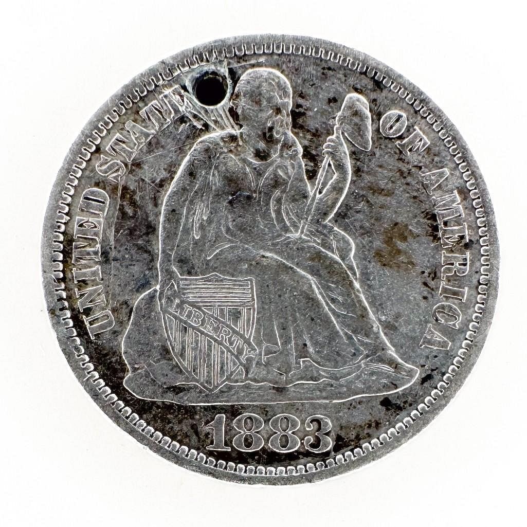 1883 Seated Liberty Dime, Love Token: An 1883 Seated Liberty dime worked into a love token. A hand-engraved keepsake piece. Shipping & Handling. All lots won by the same bidder are combined into one shipment via USPS Priority Mail