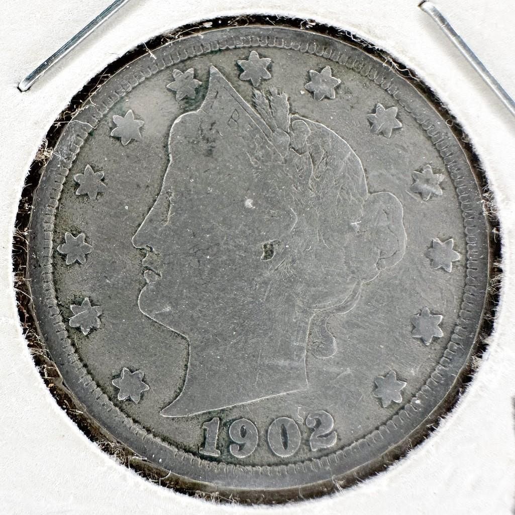 1902 Liberty Nickel: A 1902 Liberty Head 'V' nickel. A circulated turn-of-the-century five-cent coin. Shipping & Handling. All lots won by the same bidder are combined into one shipment via USPS Priority Mail (tracking