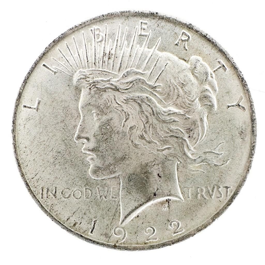 1922 Peace Dollar: A 1922 Peace dollar. A high-mintage common date. Shipping & Handling. All lots won by the same bidder are combined into one shipment via USPS Priority Mail (tracking included). Flat rate by package si