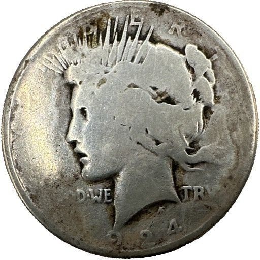 1924 Peace Dollar: A 1924 Peace dollar from the Philadelphia Mint. A common issue of the series. Shipping & Handling. All lots won by the same bidder are combined into one shipment via USPS Priority Mail (tracking inclu