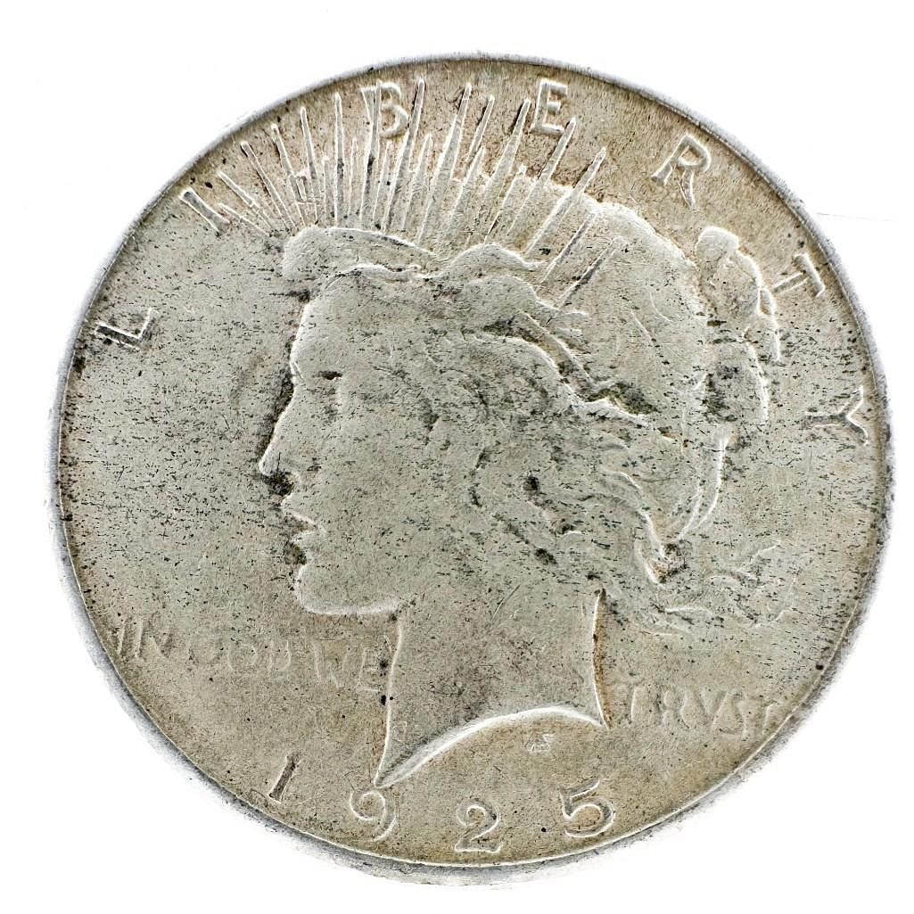 1925 Peace Dollar: A 1925 Peace dollar from the Philadelphia Mint. A common issue of the series. Shipping & Handling. All lots won by the same bidder are combined into one shipment via USPS Priority Mail (tracking inclu