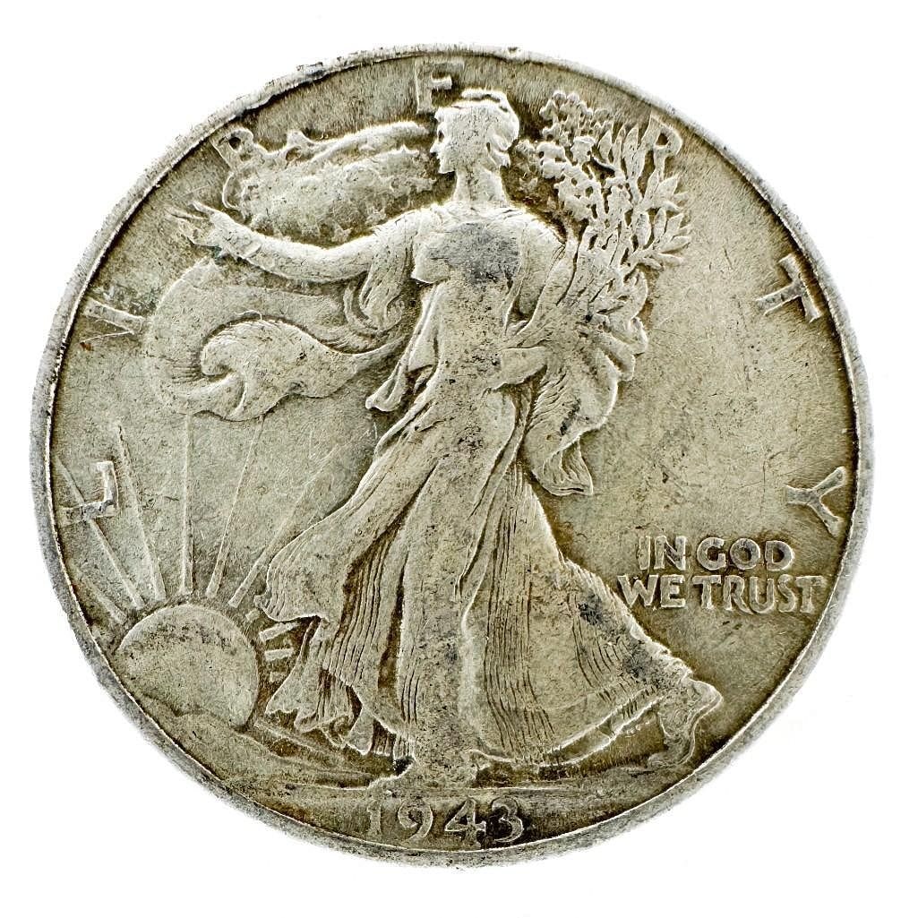 1943 Walking Liberty Half Dollar: A 1943 Walking Liberty half dollar. A high-mintage Philadelphia issue. Shipping & Handling. All lots won by the same bidder are combined into one shipment via USPS Priority Mail (tracking included). F