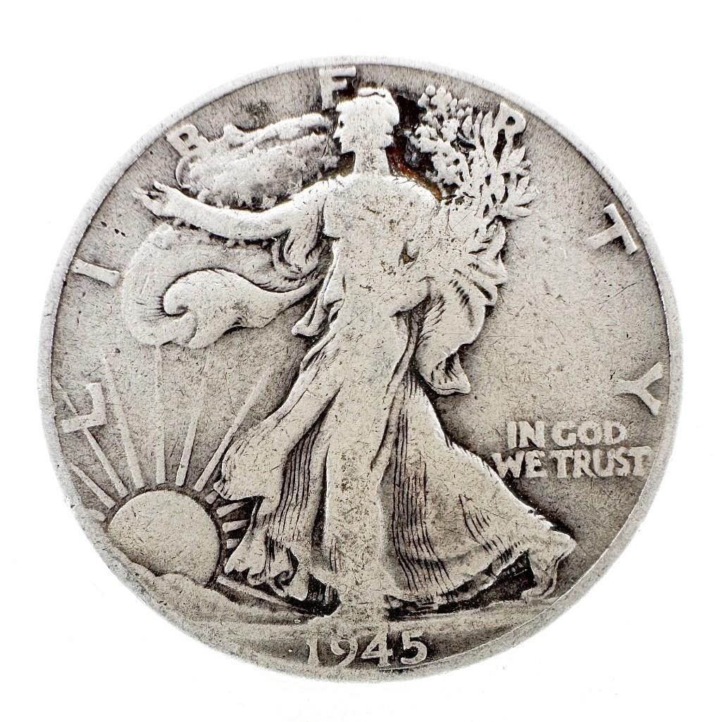 1945 Walking Liberty Half Dollar: A 1945 Walking Liberty half dollar. A common Philadelphia date. Shipping & Handling. All lots won by the same bidder are combined into one shipment via USPS Priority Mail (tracking included). Flat rat