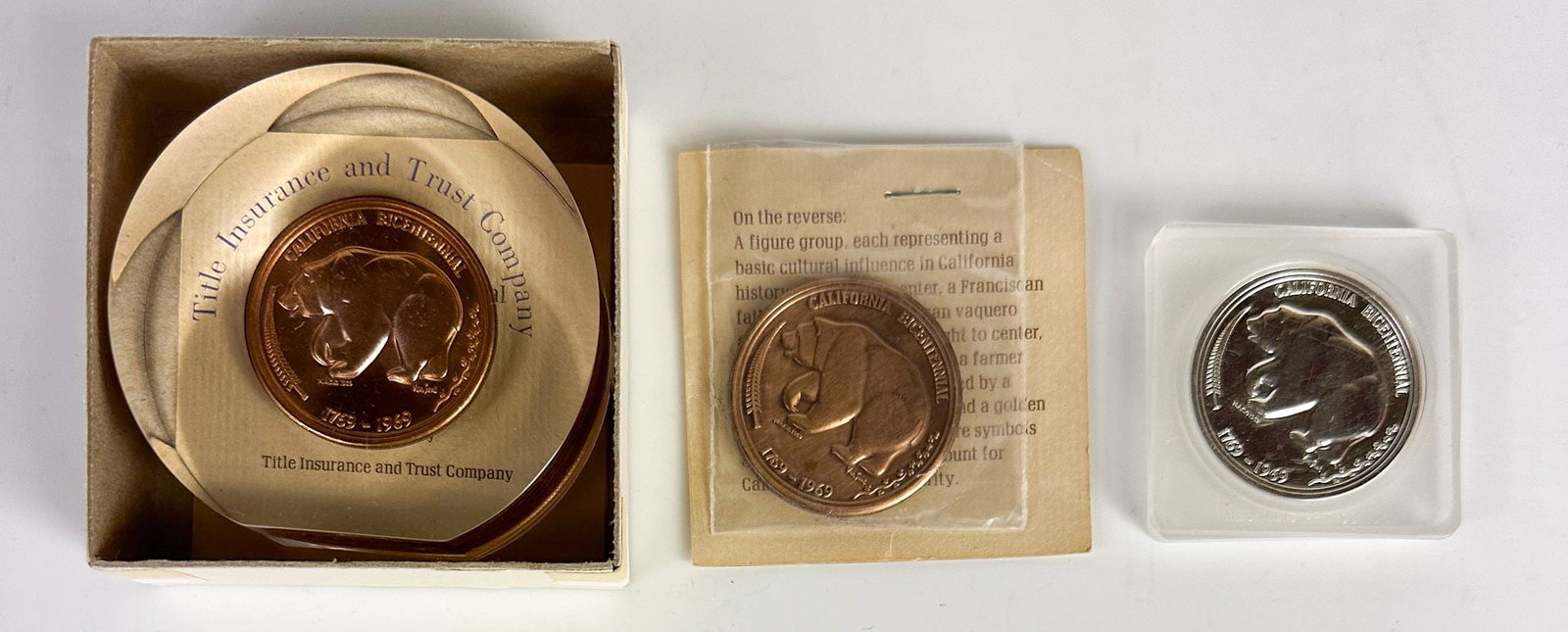 Lot of 3 California Bicentennial Bear Medals, 1769-1969 (One Silver, Two Bronze): Three California Bicentennial 'bear' medals of the same 1769-1969 design, distributed by Title Insurance and Trust Company. One is housed in a capsule and the others retain original packaging.