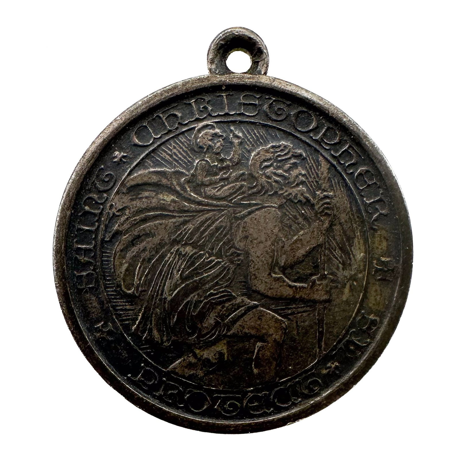 Sterling Saint Christopher Travel Medal, 'Non Dimenticar': A round St. Christopher travel medal with the Italian inscription 'Non Dimenticar' and a hanging loop. Shows wear consistent with use as a travel charm. Shipping & Handling. All lot