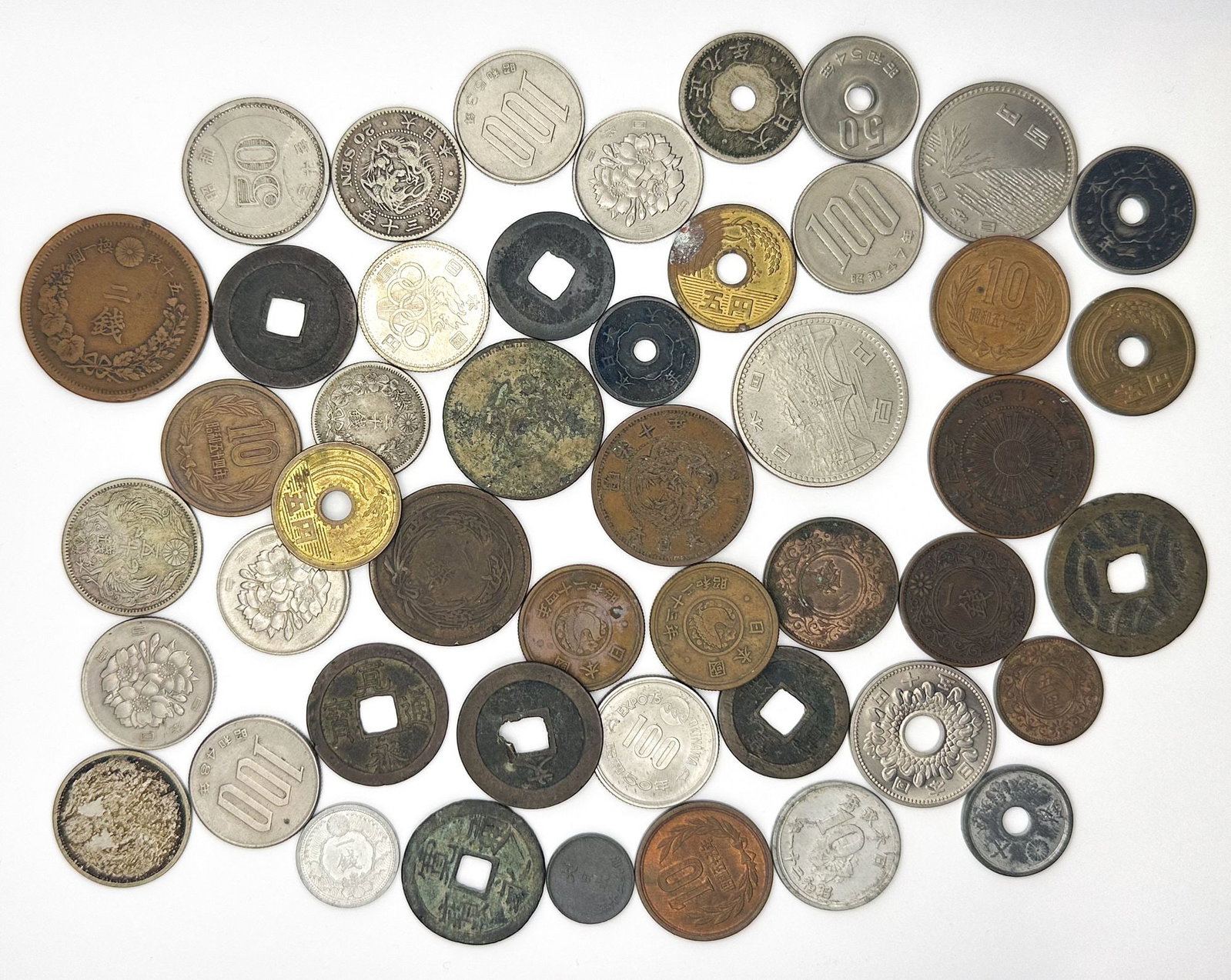 Collector's Lot 25 Antique & Vintage Japanese Coins: About 25 antique and vintage Japanese coins of various denominations and designs. Many show age and wear consistent with their history. Shipping & Handling. All lots won by the same bidder are combine