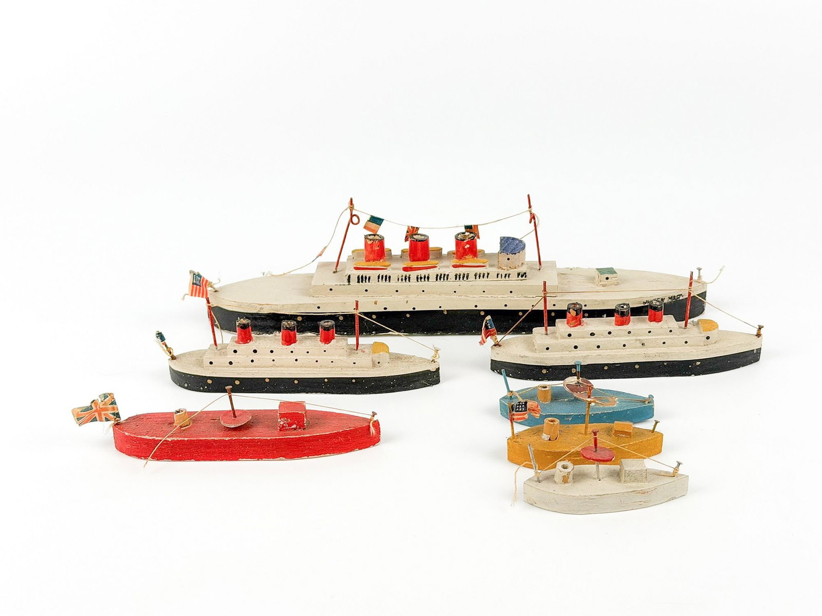 Set of 7 Vintage Empress Wooden Model Ships: Set includes box and 7 hand painted ships. Dimensions: Approx. range: 3 in H x 9.5 in W x 2.5 in D. to 1 in H x 2.5 in W x 1 in D. Weight: 8 oz.