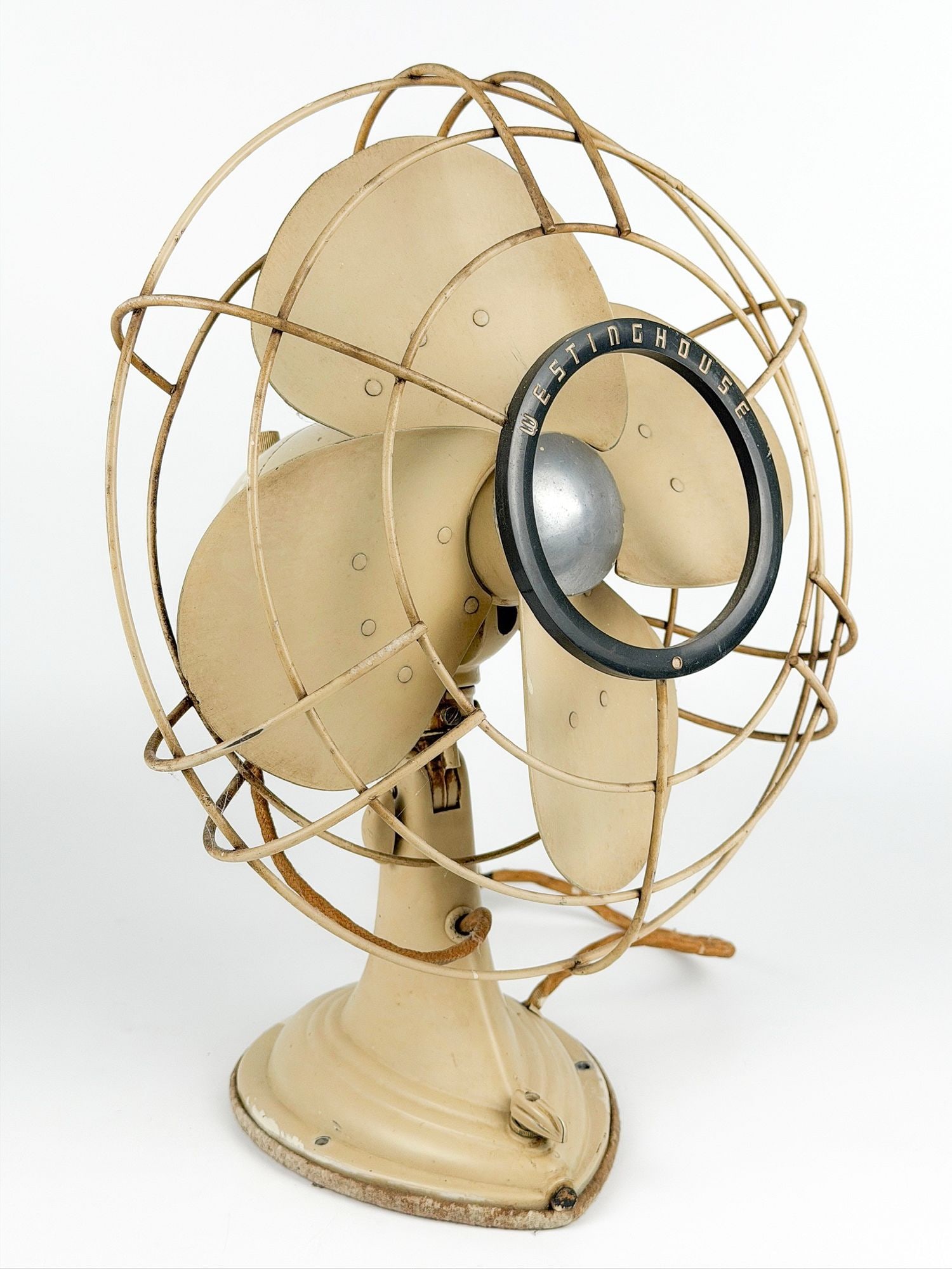 SS United States Stateroom Wall-Mount Oscillating Fan: Stateroom wall-mount oscillating fan in working condition. Dimensions: Approx. 17.5 in H x 14 in W x 10.5 in D. Weighs approximately 13 lbs.