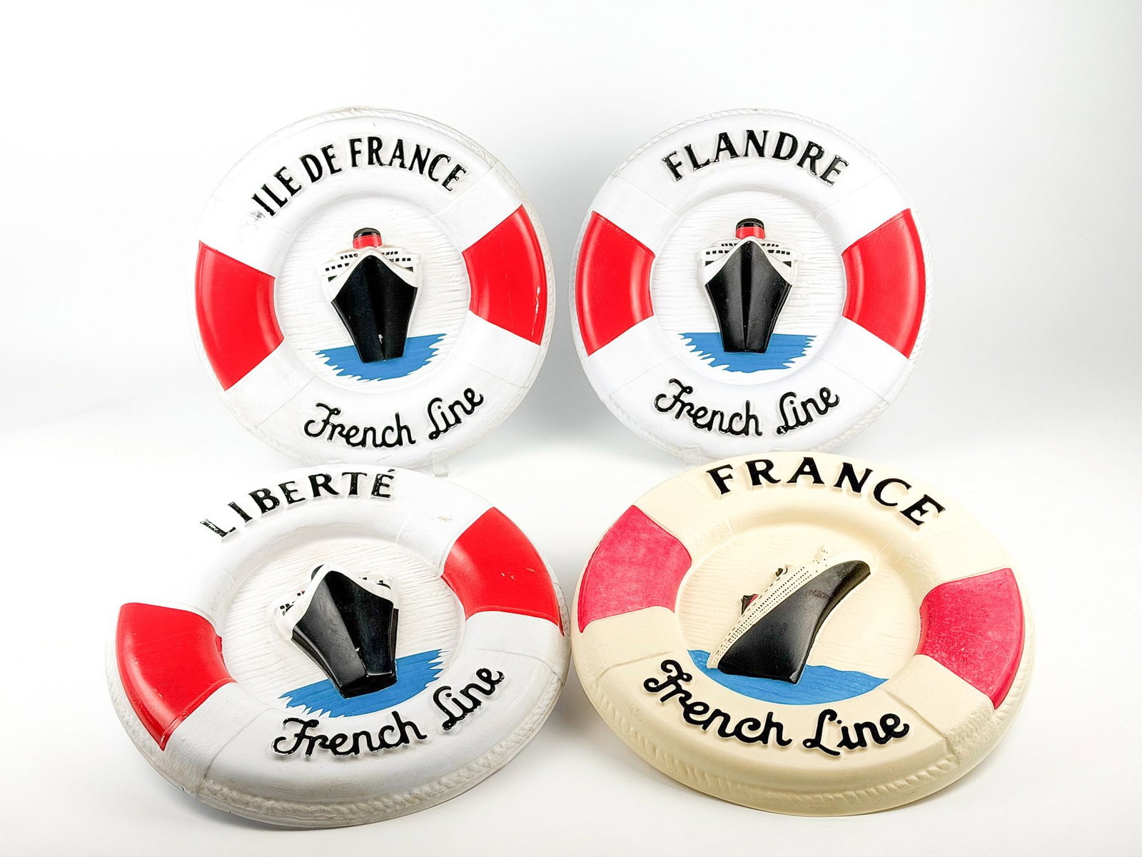 Lot of 4 French Line Plastic Signs