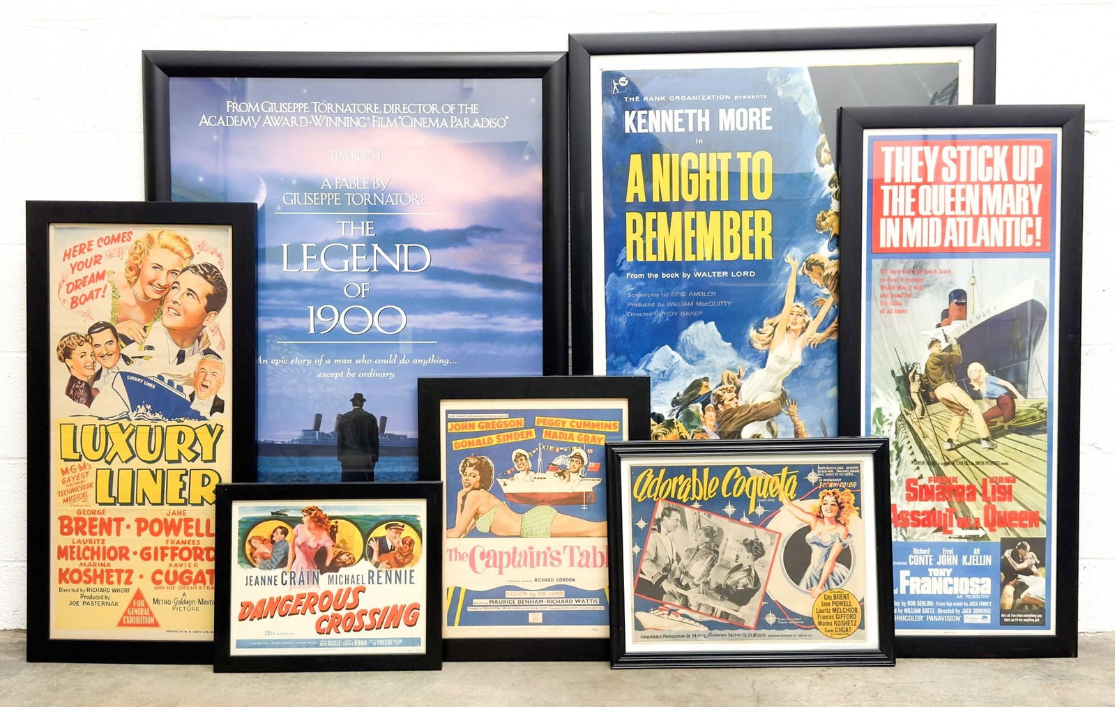 Misc. Ships Vintage Ocean Liner Movie Posters (7): Collection of seven vintage ocean liner-related movie posters: A Night to Remember (one sheet), The Legend of 1900 (one sheet), Luxury Liner (33 in x 16 in), Adorable Coqueta/Luxury Liner Spanish vers