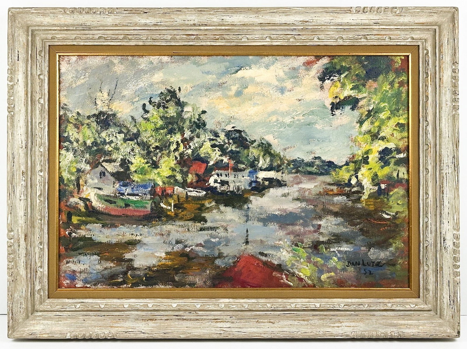 Dan (Daniel Stookey) Lutz (1906-1978) Oil on Canvas, River At Saugatuck, Kalamazoo 1952: Saugatuck on the Kalamazoo Lake in Michigan river scene with houses and boats.Signed and dated on lower right corner. Period 1950s frame. Label on back. Dimensions: Frame approx. 27.5 in H x 37.5 in W