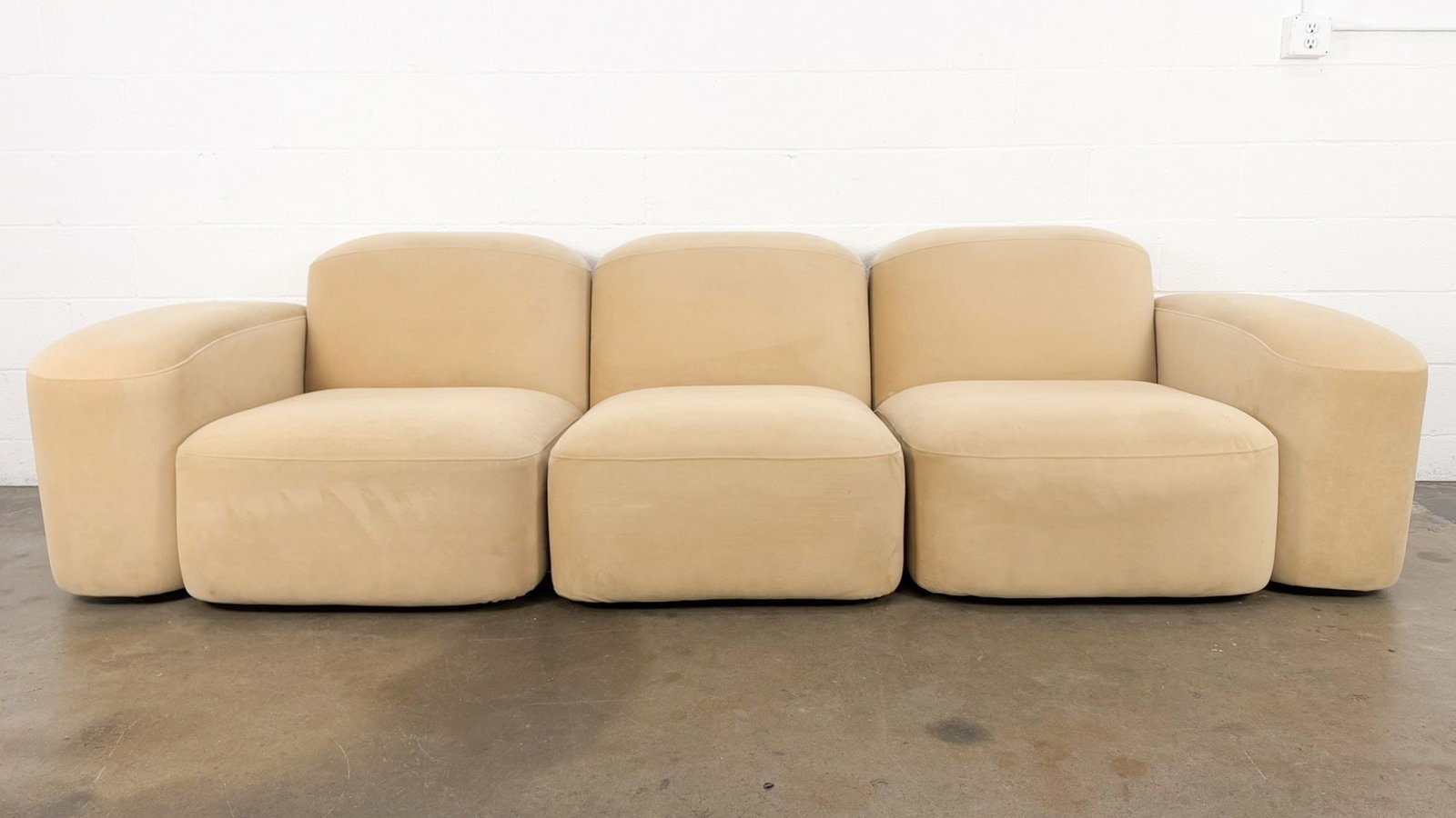 Ellison Studios Muse Sectional Sofa in Tan Faux Suede: Features tan faux suede upholstery. Each segment can be arranged independently from one another. Dimensions: Approx dimensions: 28 in H x 110 in W x 39 in D. LOCAL PICK UP INFORMATION:Wednesday, Septe