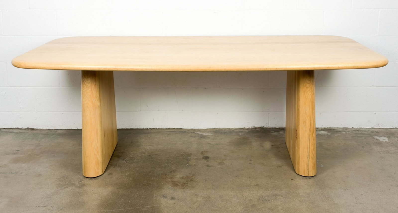 Lulu and Georgia Mela Dining Table: Natural wood grain and rounded edges. Seats six. Dimensions: Approximately 30 in H x 84 in W x 40 in D. Weighs approximately 260 lbs. LOCAL PICK UP INFORMATION:Wednesday, September 16, 10:00 AM-2:00 P