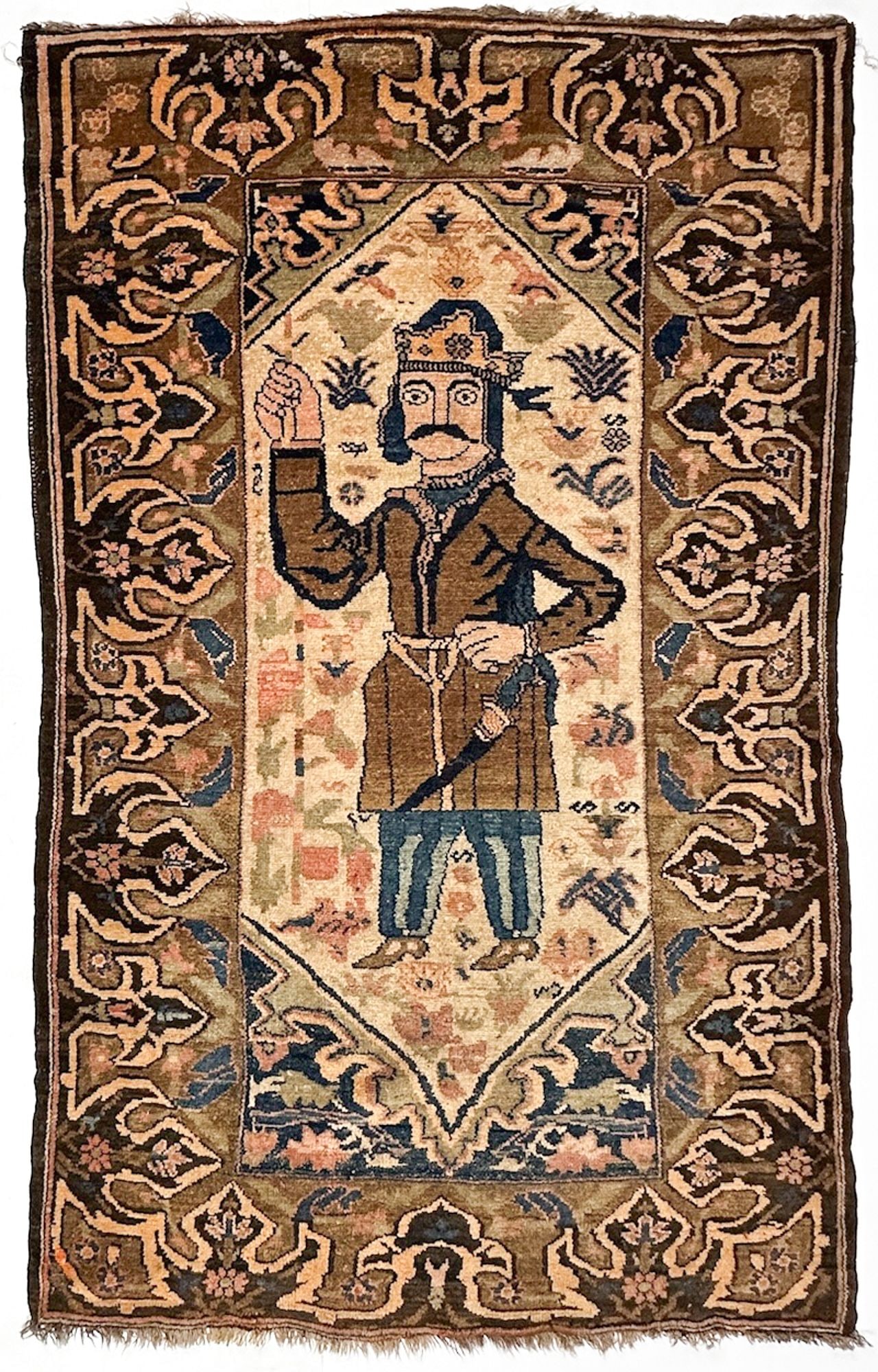 Persian Kerman Hand-knotted Wool Rug with Figure, Circa 1920, 5.75' x 3.6': Brown/Navy. Hand-knotted. Wool. Dimensions: 69 in W x 44 in L. Weighs 7 lbs 4 oz. LOCAL PICK UP INFORMATION:Wednesday, September 16, 10:00 AM-2:00 PM at 8059 Foothill Blvd, Sunland, CA 91040 SHIPPING: