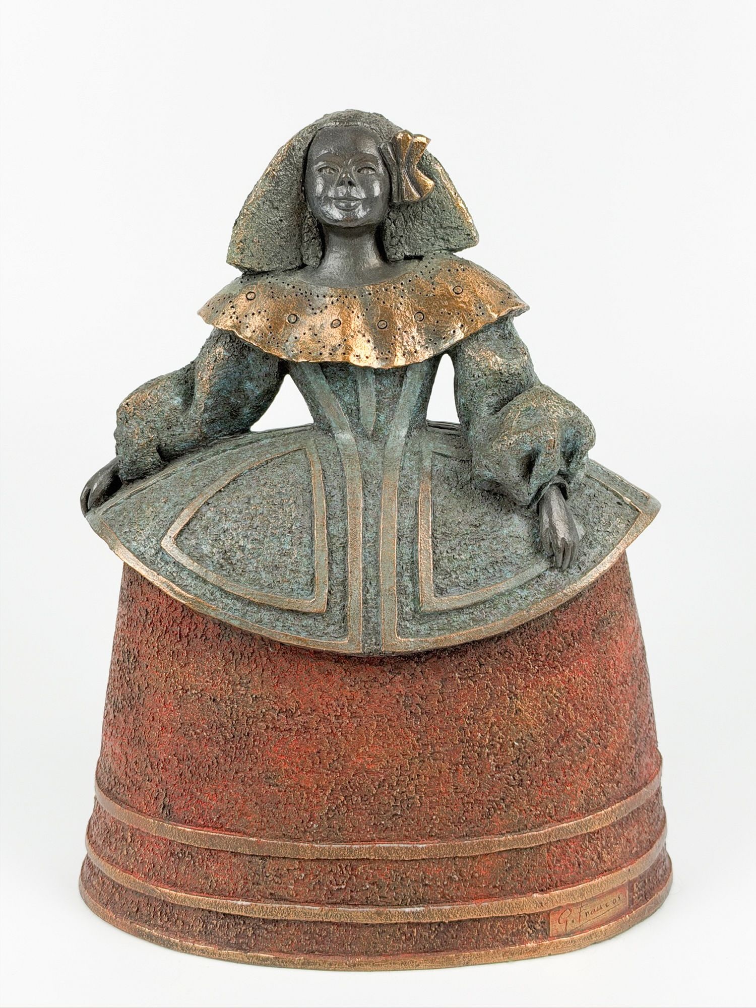 Resin Sculpture of a Menina in the Style of Pilar Gomez Francos: Inspired by Diego Velazquez's painting Las Meninas featuring a girl in a wide crinoline style gown. Sculpture replicates various patinas on bronze. Dimensions: Approximately 11.25 in H x 8.75 in W x 5