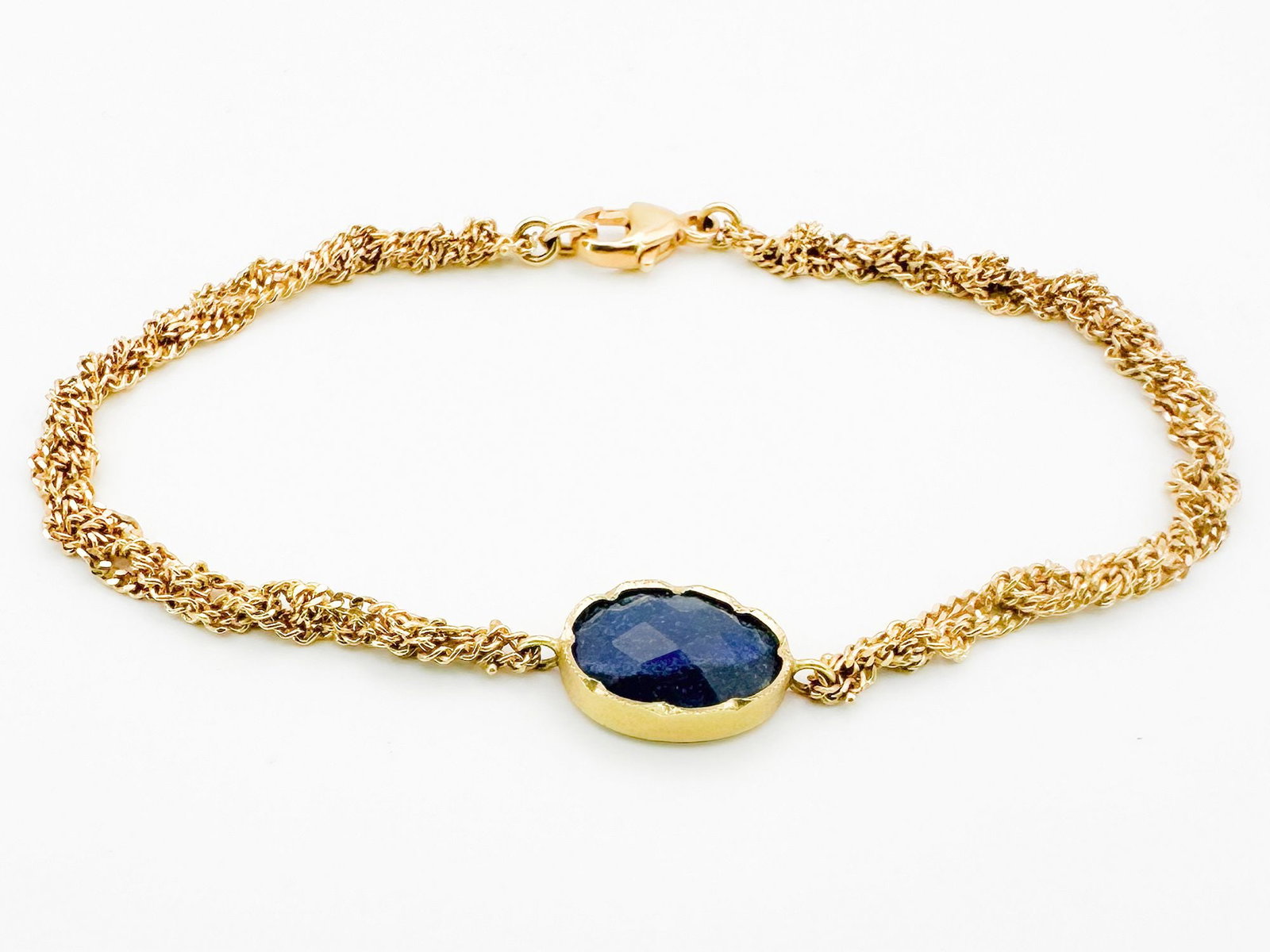 Brooke Gregson 18K Gold & Sapphire Bracelet: Brooke Gregson 18K yellow gold bracelet featuring a faceted sapphire. Dimensions: Measures approximately 6.75 inches long and weighs 5 grams. LOCAL PICK UP INFORMATION:Wednesday, September 16, 10:00 A