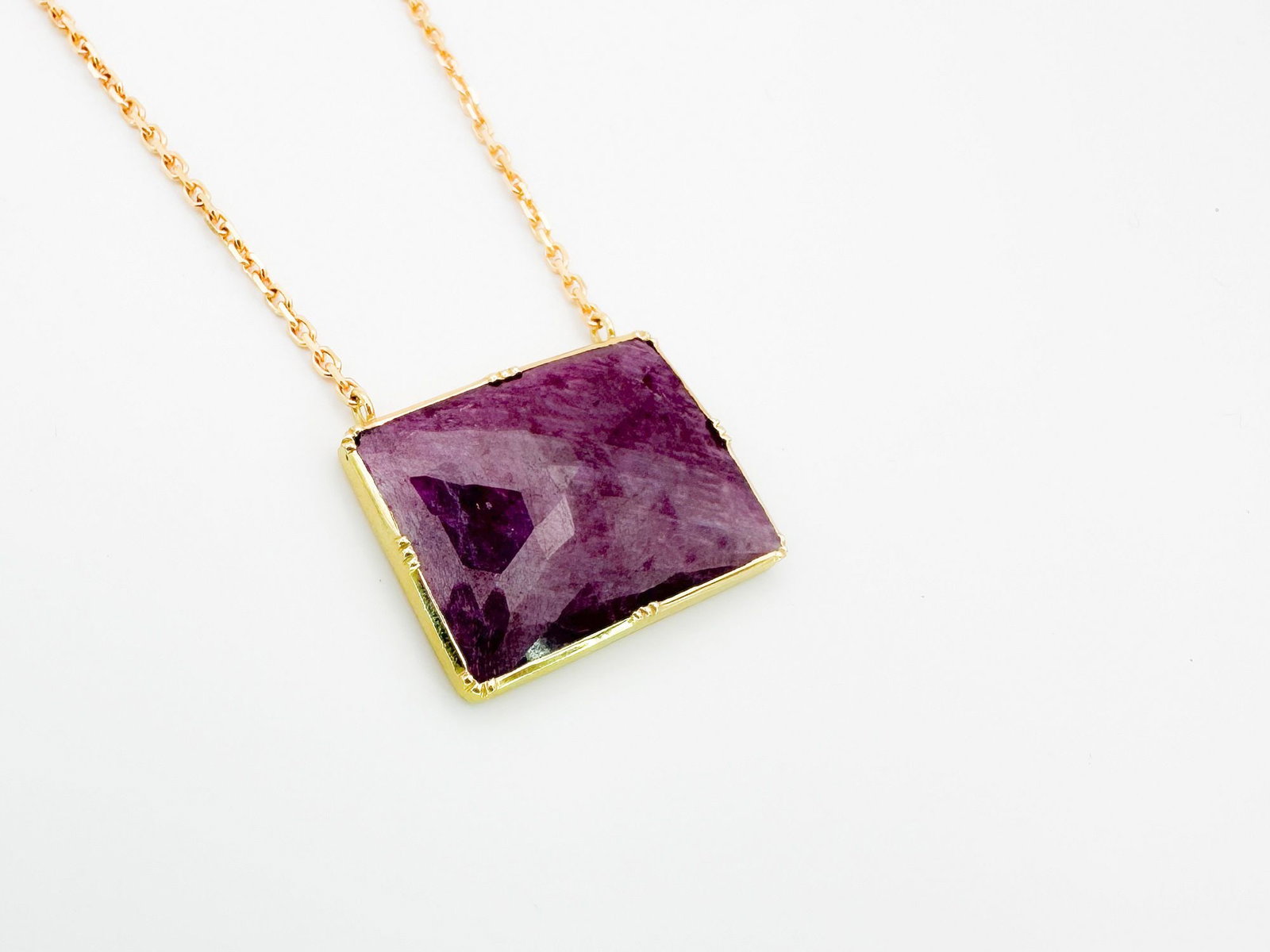Brooke Gregson 18K Gold & Ruby Pendant Necklace: Brooke Gregson necklace featuring a faceted ruby pendant set in 18K gold. Dimensions: The chain measures 17 inches, and the pendant is 1 inch wide. Total weight: 7.2 grams. LOCAL PICK UP INFORMATION:W
