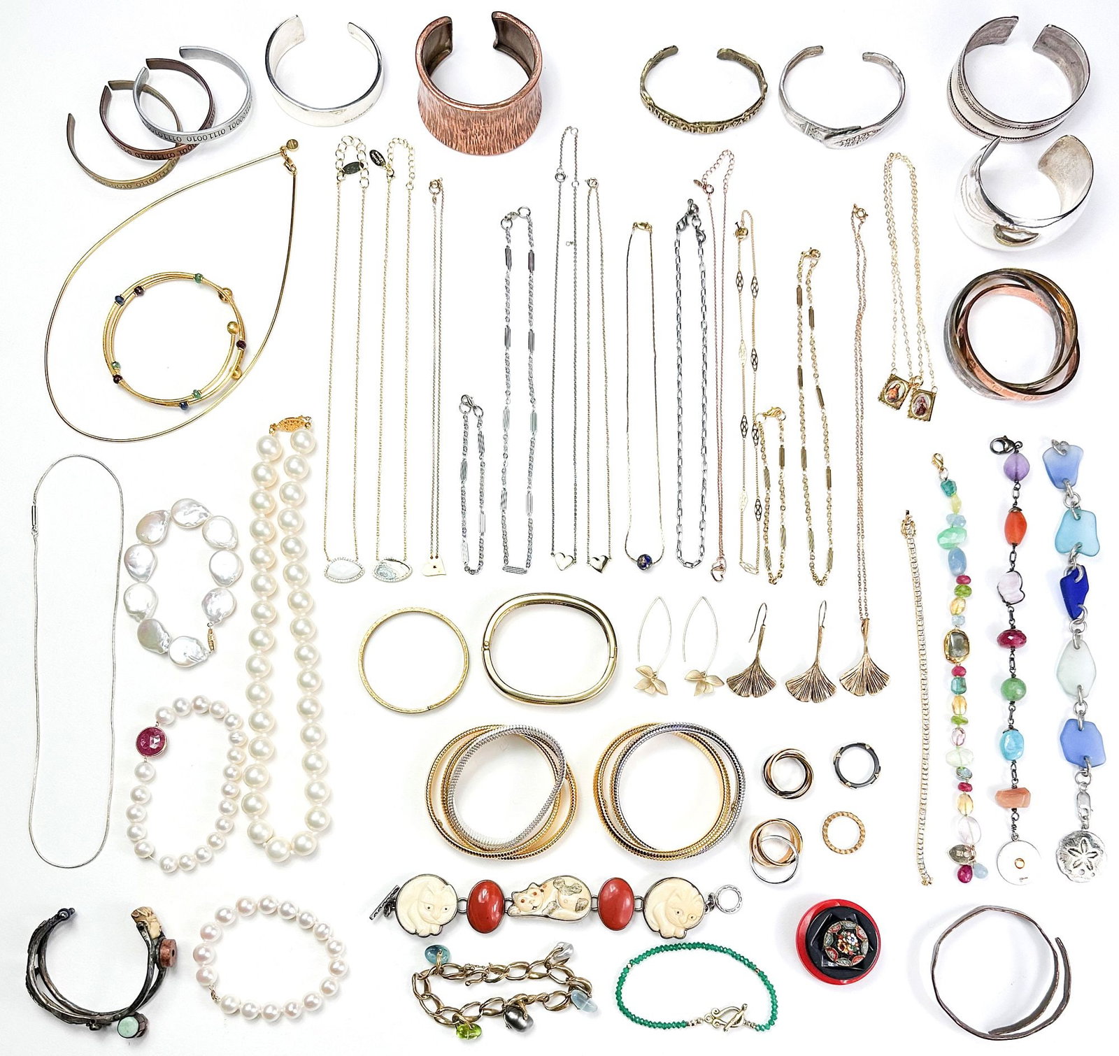 Collection of 50+ Costume and Sterling Silver Designer and Vintage Bracelets, Necklaces, and Rings: Lott includes gold, filled necklaces, silver cuffs, mixed metal cuffs, pearls, unique, charm, bracelets, Trinity rings, and much more. Dimensions: Sterling cuffs weigh 110 grams. LOCAL PICK UP INFORMA