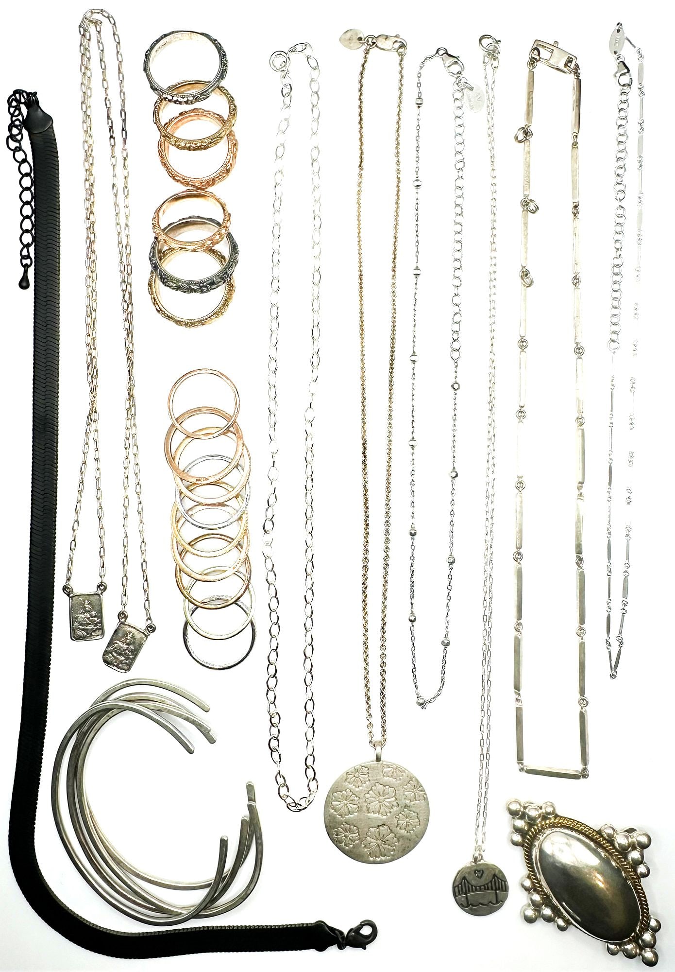 Lot of 28 Designer and Vintage Sterling Silver Necklaces, Bracelets, Rings, Brooch: Includes herring bone oxidized silver necklace, Mexican silver brooch, Me &Ro flower pendant, silver plates with gold stacking rings, bar necklace, made in Italy link chains, hand hammered small silve