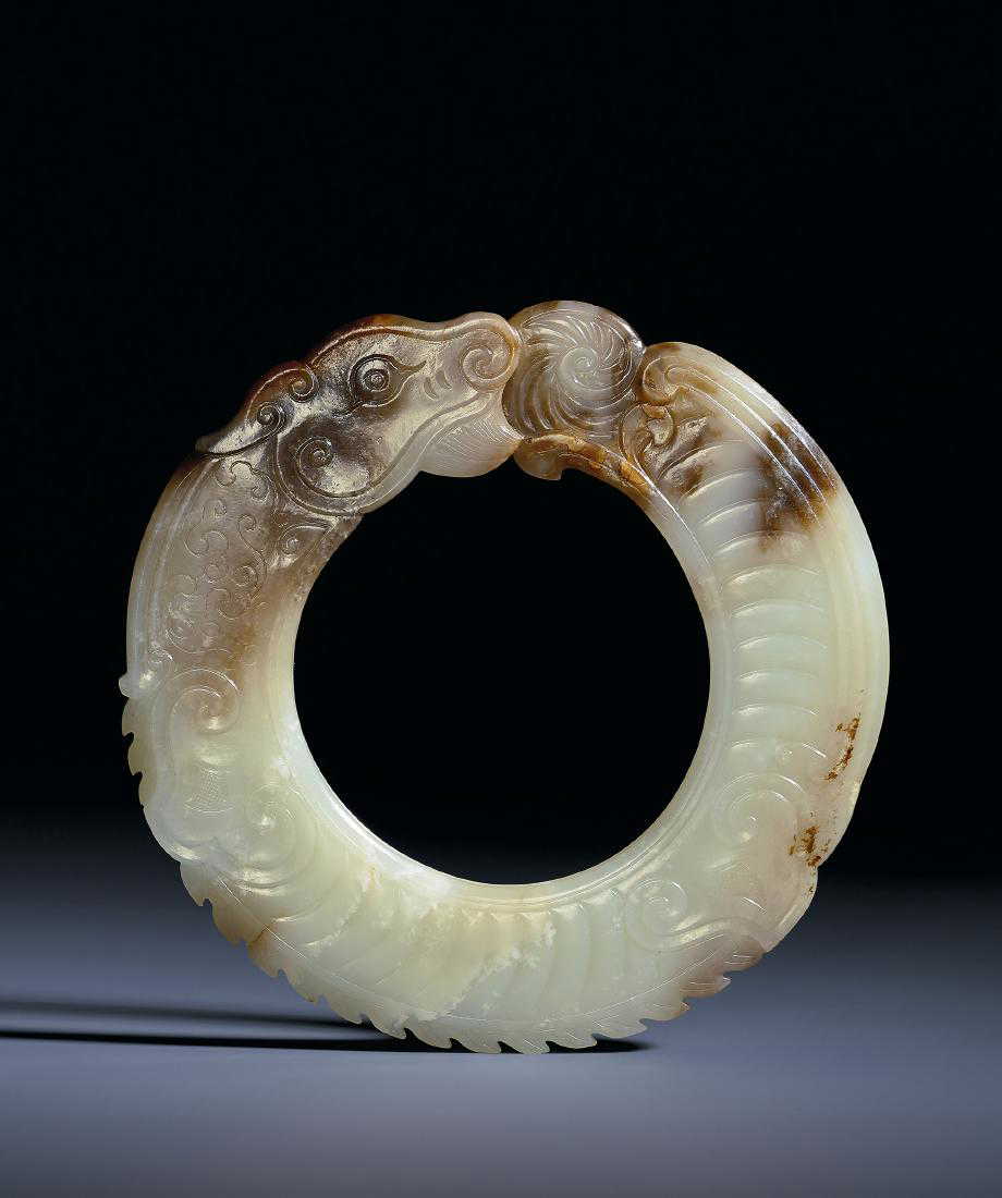 A RARE WHITE JADE RING