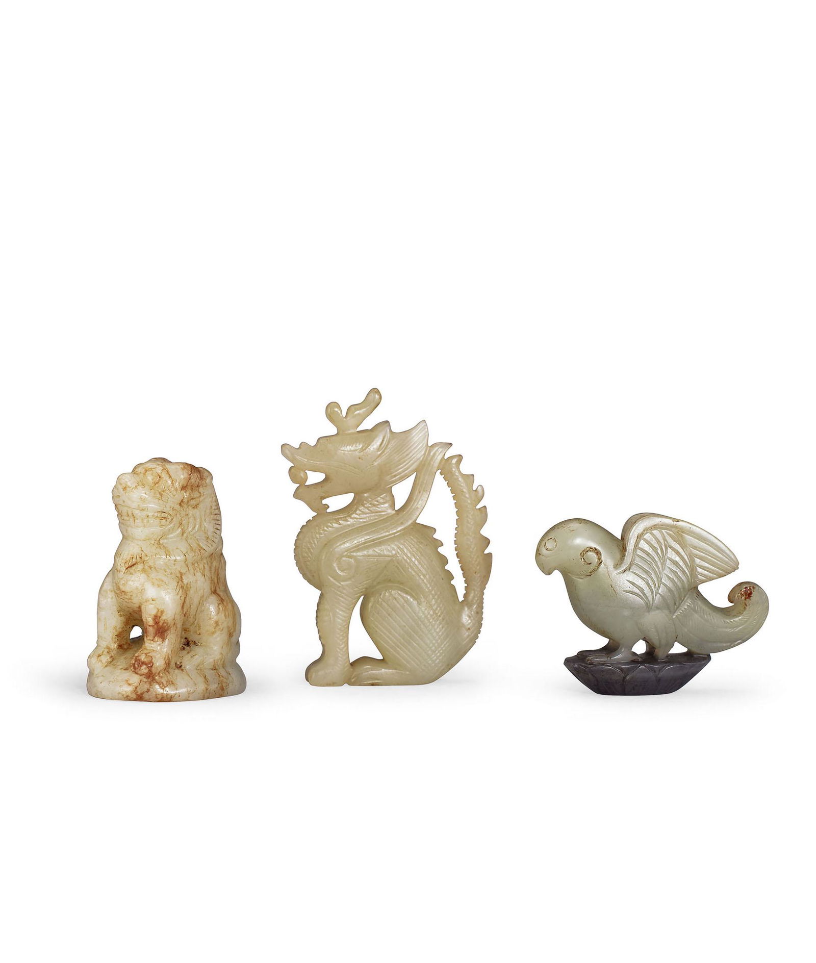 A Pale Celadon Jade Mythical Beast, A Qilin and A Parrot, Qing Dynasty Or Earlier (1 of 1)