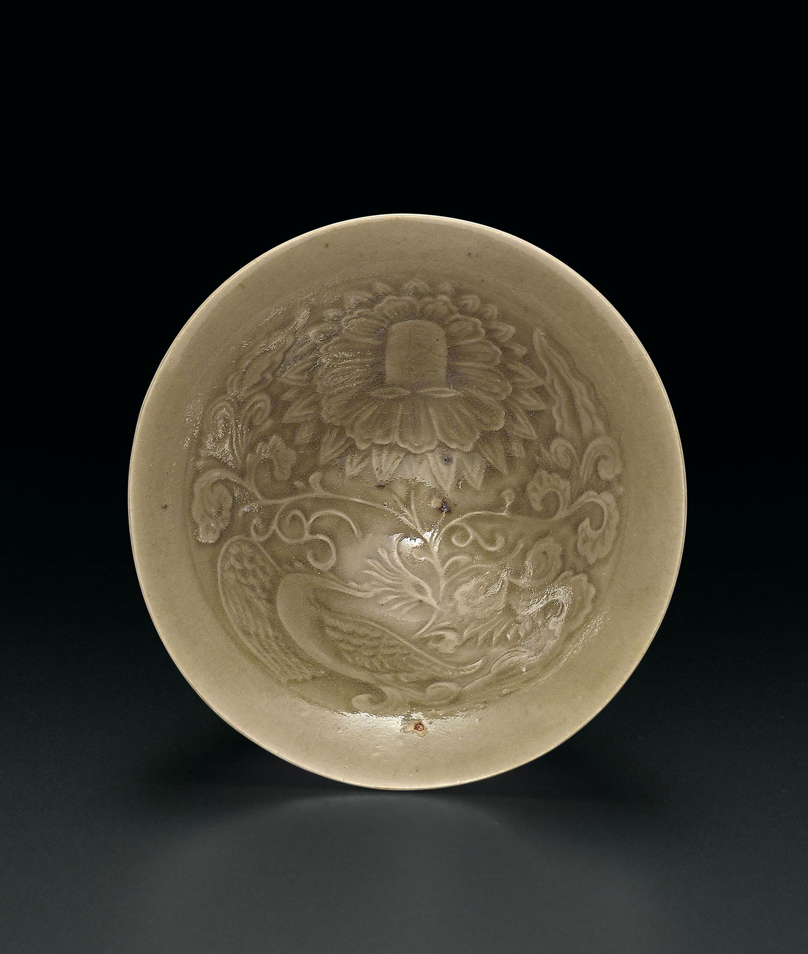 A Yaozhou Celadon-Glazed 'Phoenix' Bowl, Song Dynasty (1 of 2)