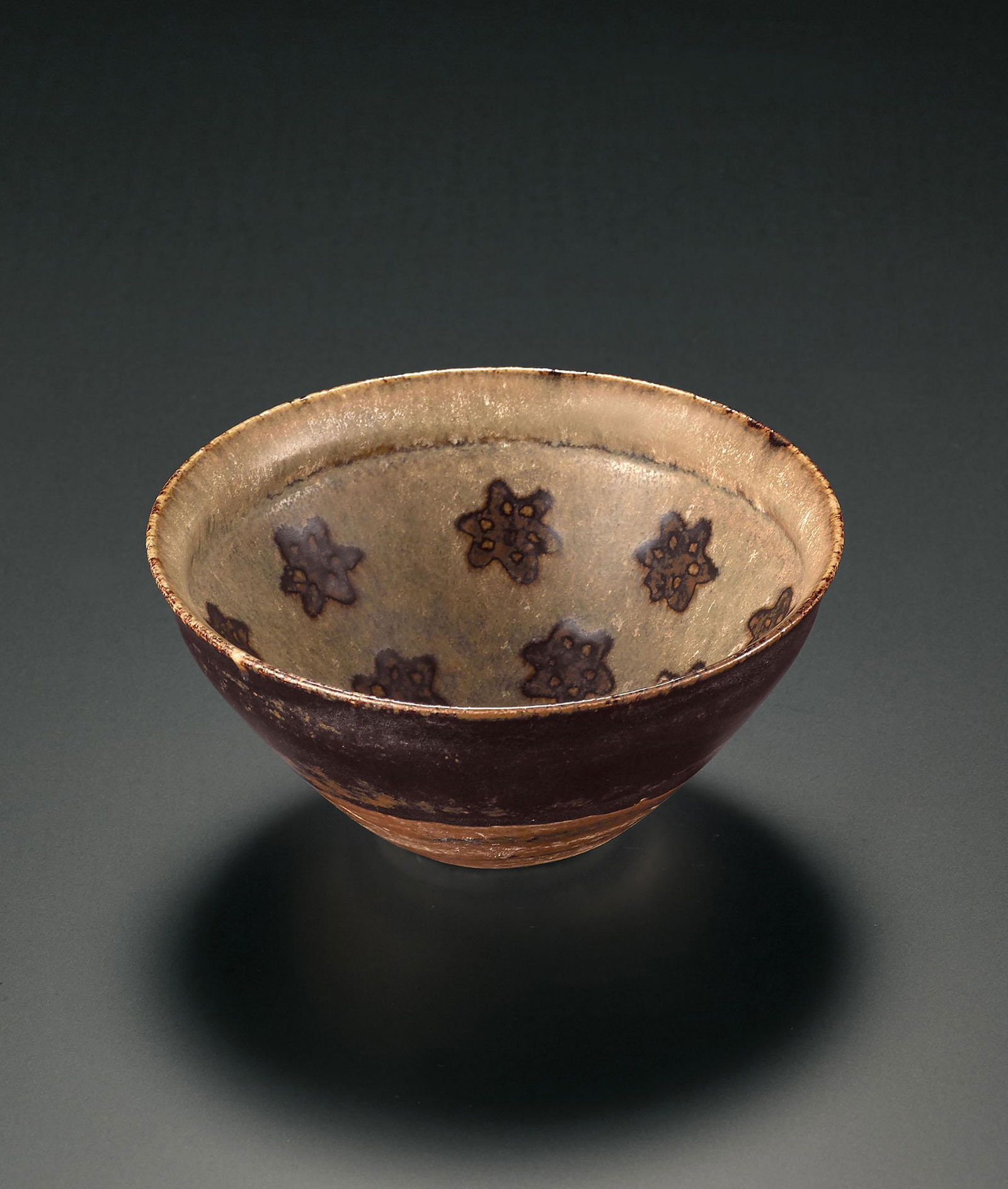 A Jizhou Paper-Cut Resist-Decorated Bowl, Song Dynasty (1 of 3)