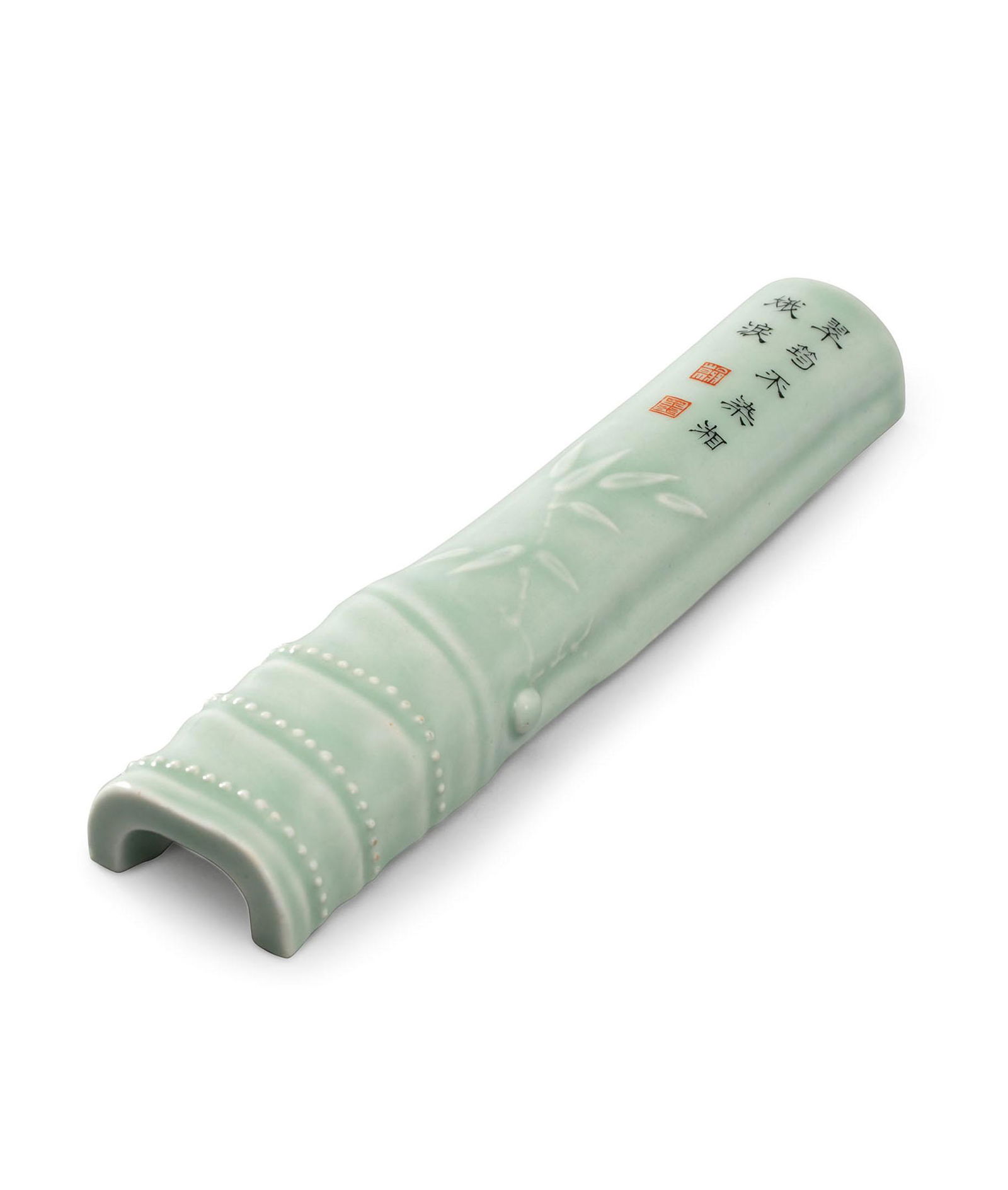 A Celadon-Glazed 'Bamboo' Wrist Rest, Qing Dynasty (1 of 2)