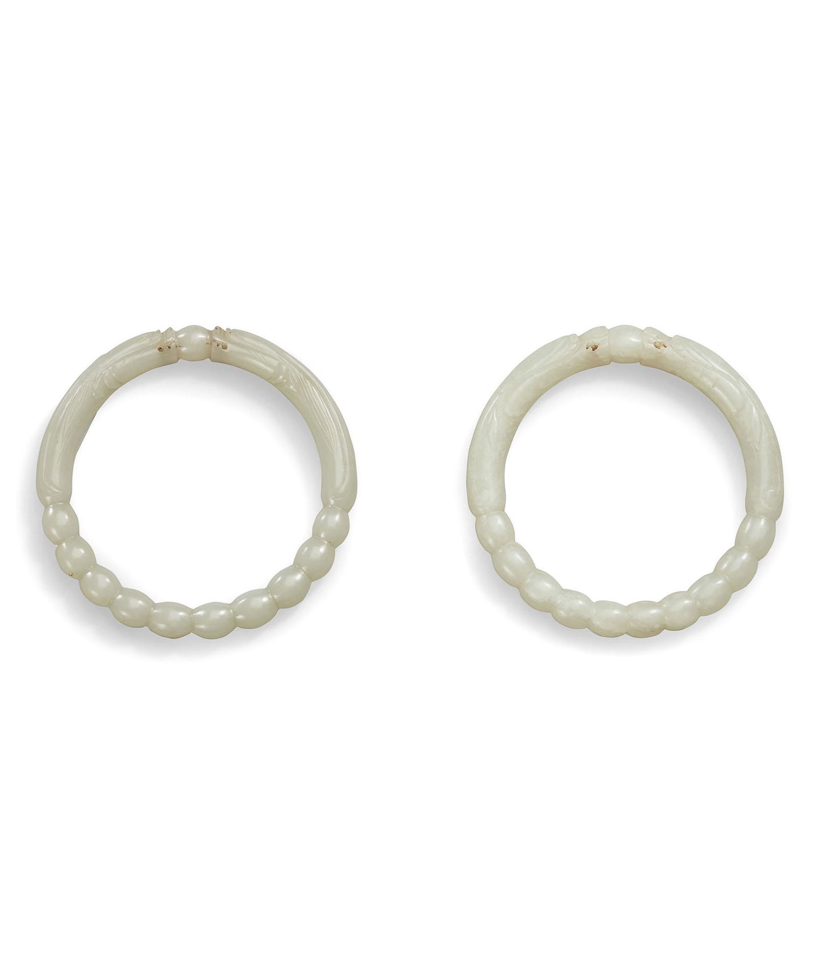 A Pair of White Jade 'Dragon' Bangles, Qing Dynasty (1 of 1)