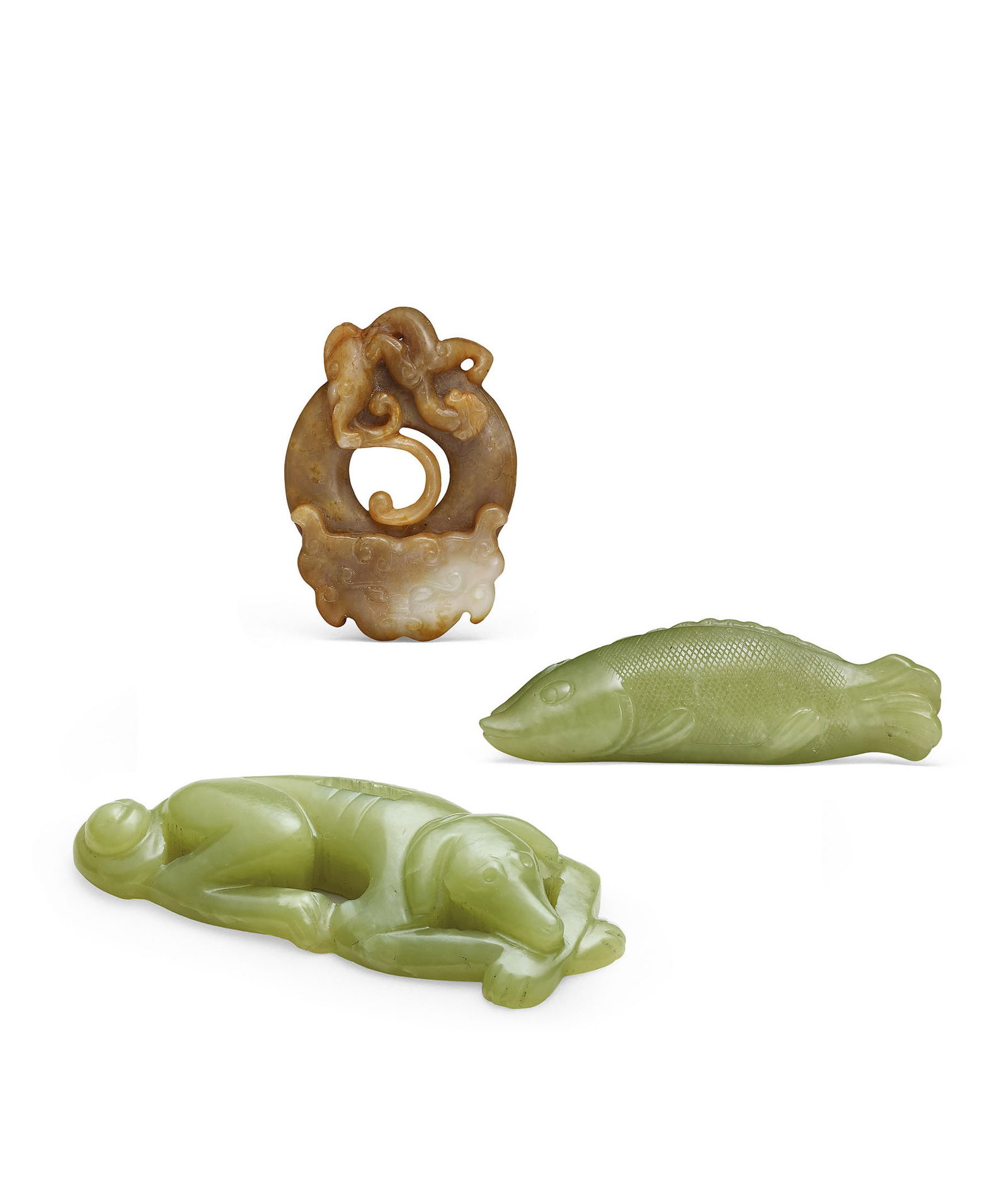Jade 'Beast-Mask' Bi Disc, a Yellow Jade Fish and a Yellow Jade Dog, Qing Dyn.: 105 清 玉獸面紋出廓璧、黃玉魚、黃玉犬 三件一組 璧 L6.4cm 魚 L8.6cm &