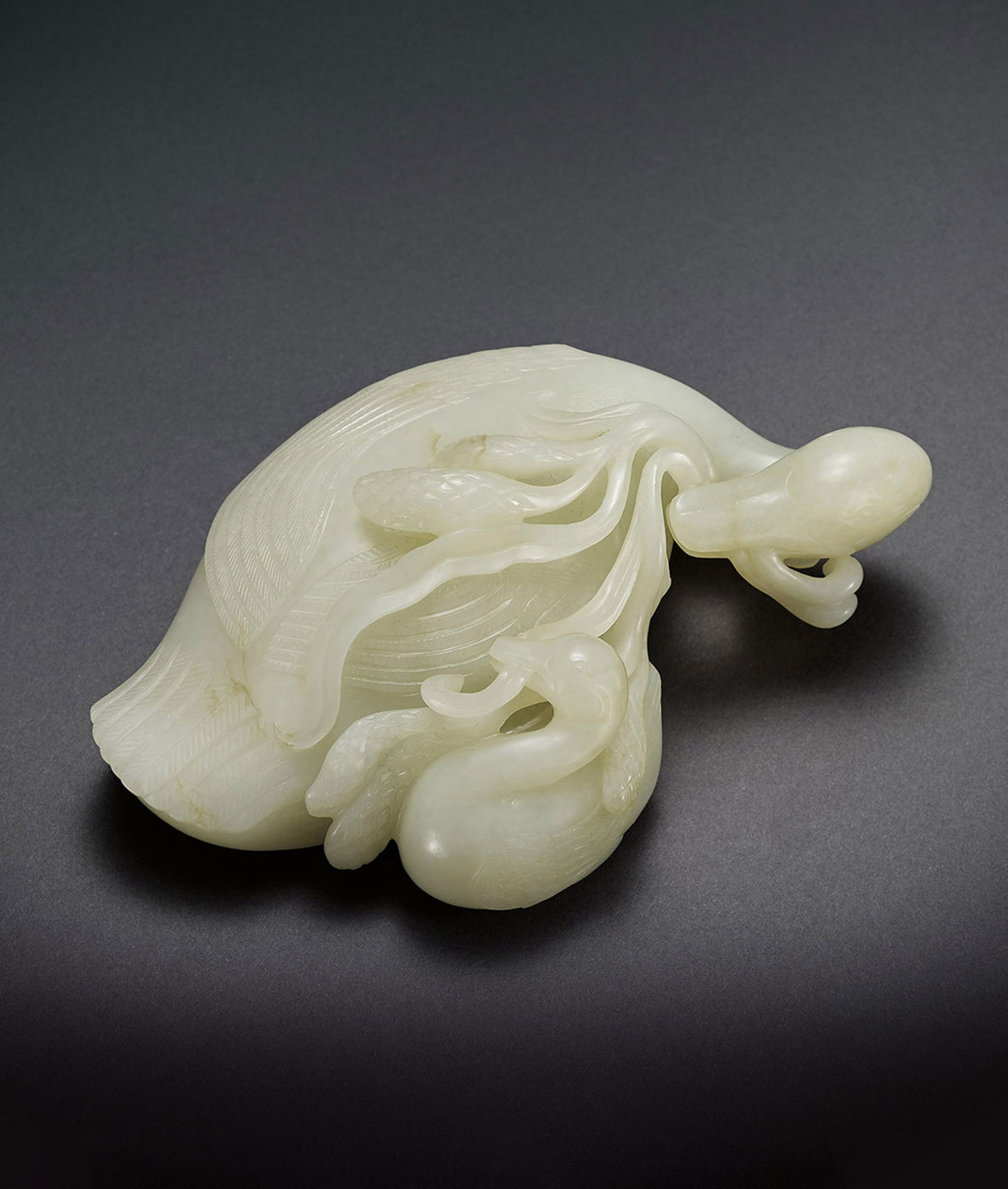 A White Jade 'Duck' Group: 107 白玉寶鴨銜穗 L18.5cm 來源：美國重要私人收藏 預估價： TWD 150,000-180,0