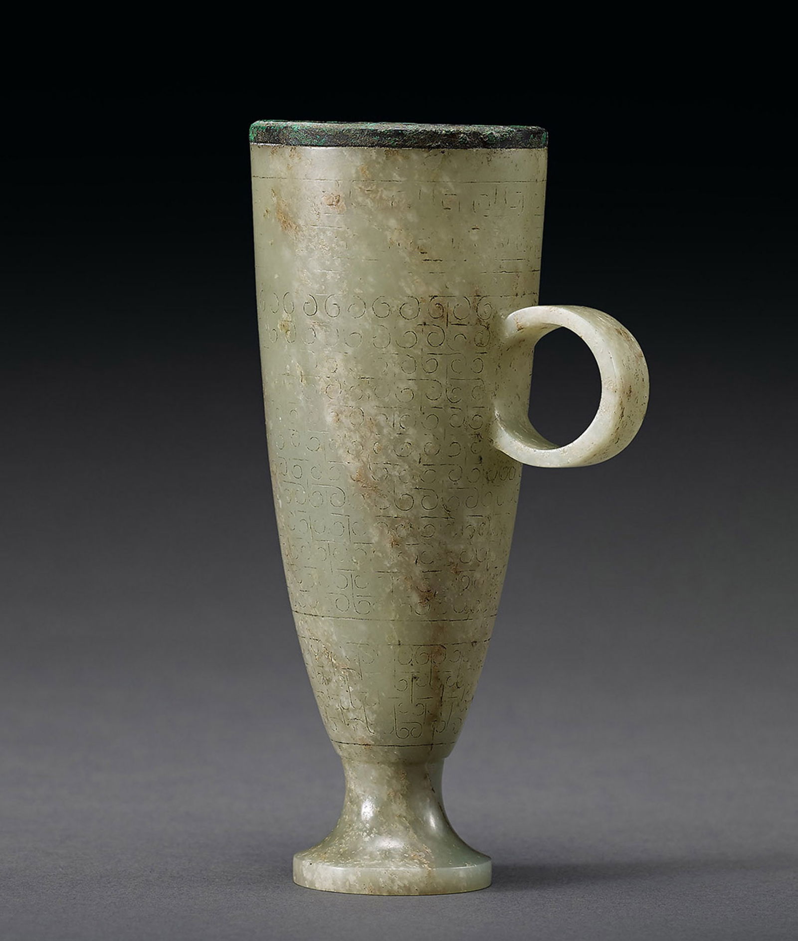 A Jade 'Cloud' Stem Cup, Qing Dynasty or Earlier: 110 清或更早 玉勾雲紋高足杯 H14cm 來源：美國重要私人收藏 杯